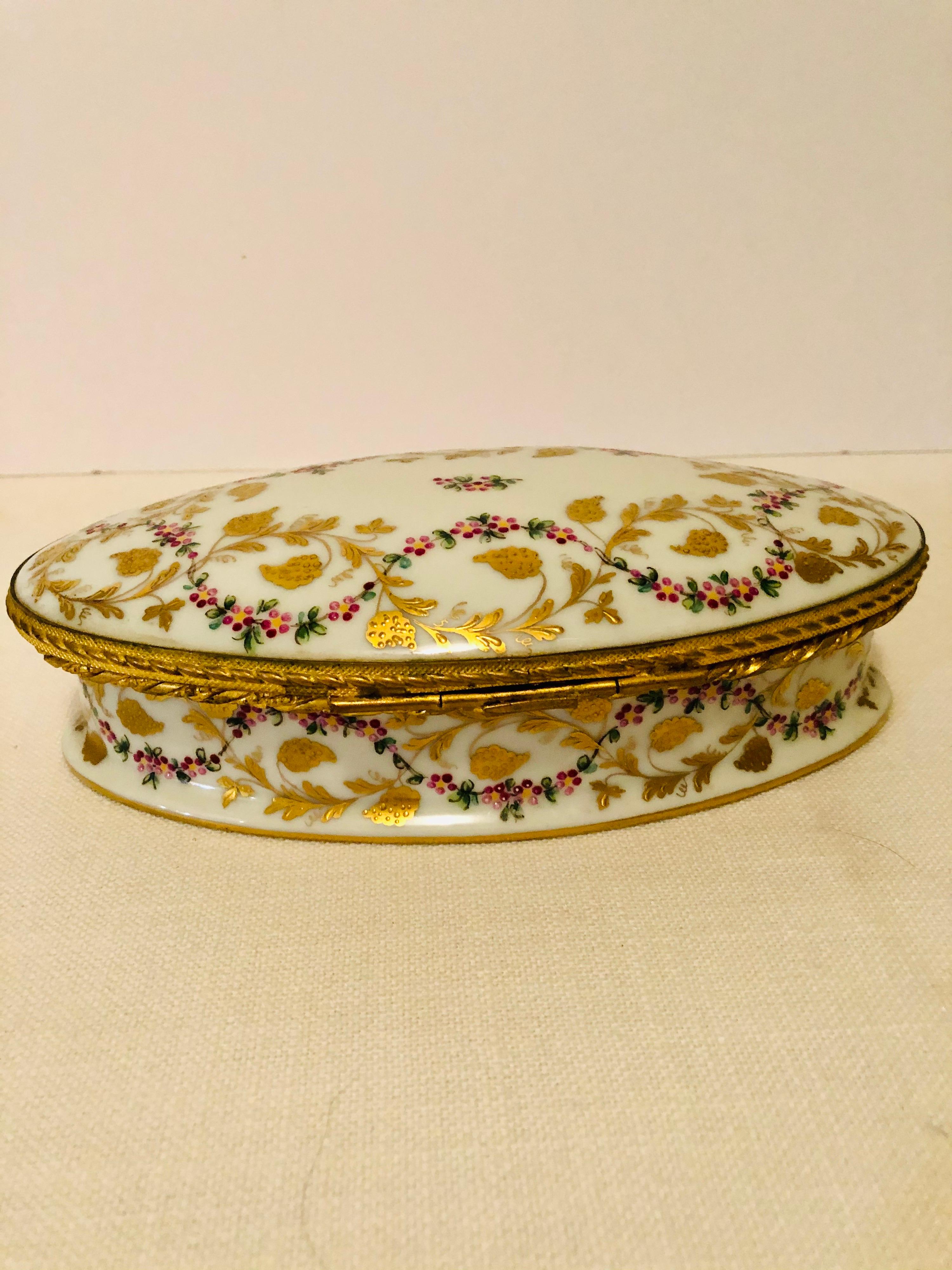 Mid-20th Century Le Tallec Oval Box with Raised Gilded Leaves & Raspberries and Ribbon of Flowers