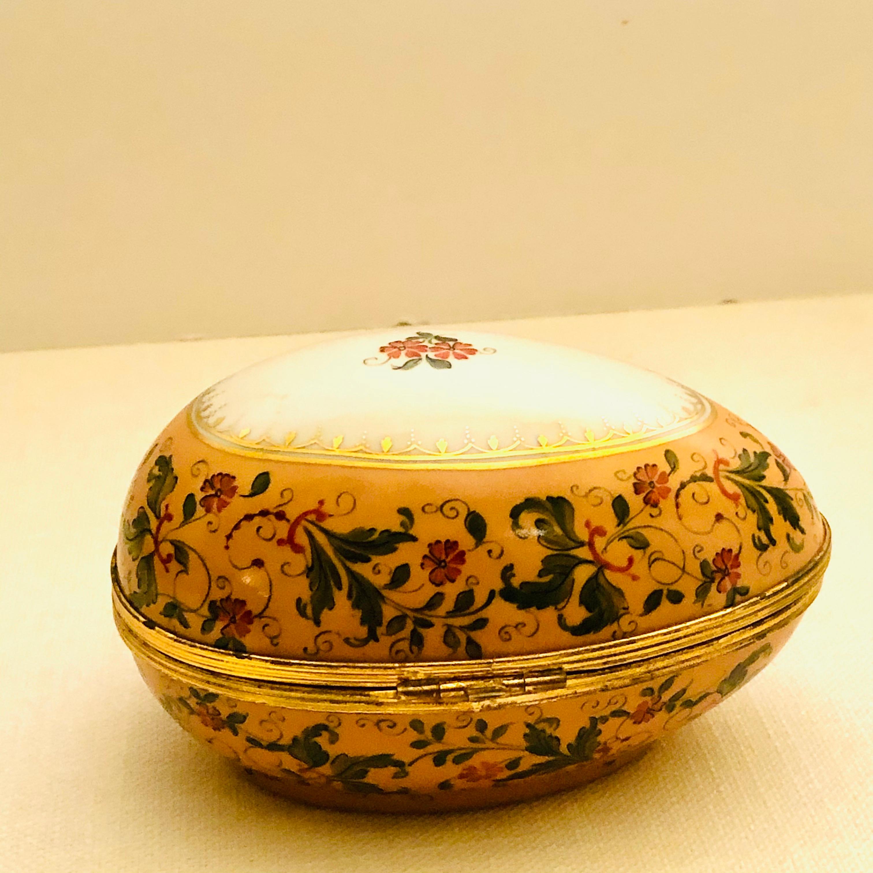 Hand-Painted Le Tallec Peach Ground Egg Shaped Box Painted with Peach Flowers & Green Leaves