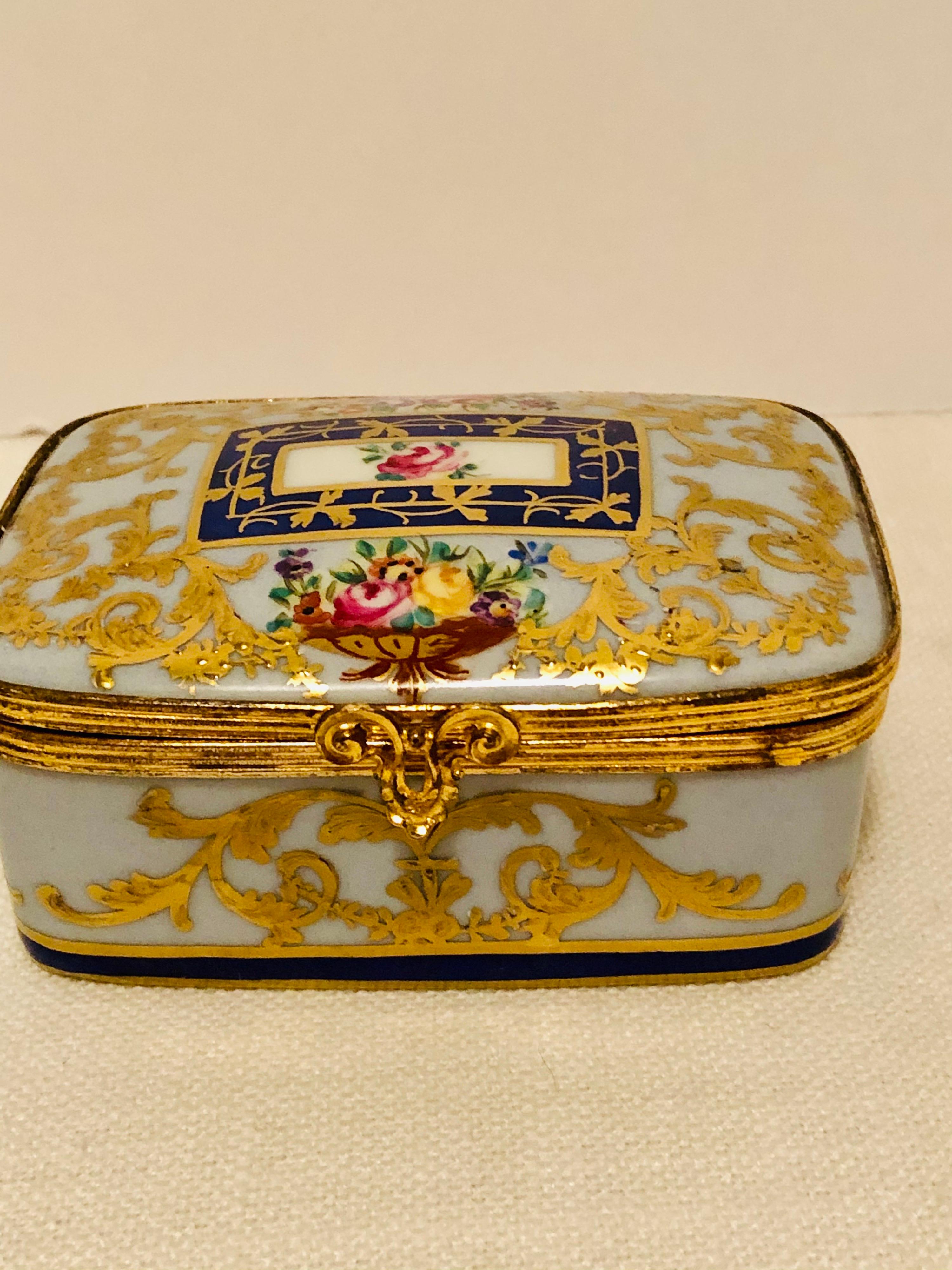 Hand-Painted Le Tallec Porcelain Box with Decorated with Flower Bouquets and Raised Gilding
