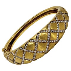 Le Triomphe 18K Yellow Gold and Diamond Quilted Design Bangle bracelet
