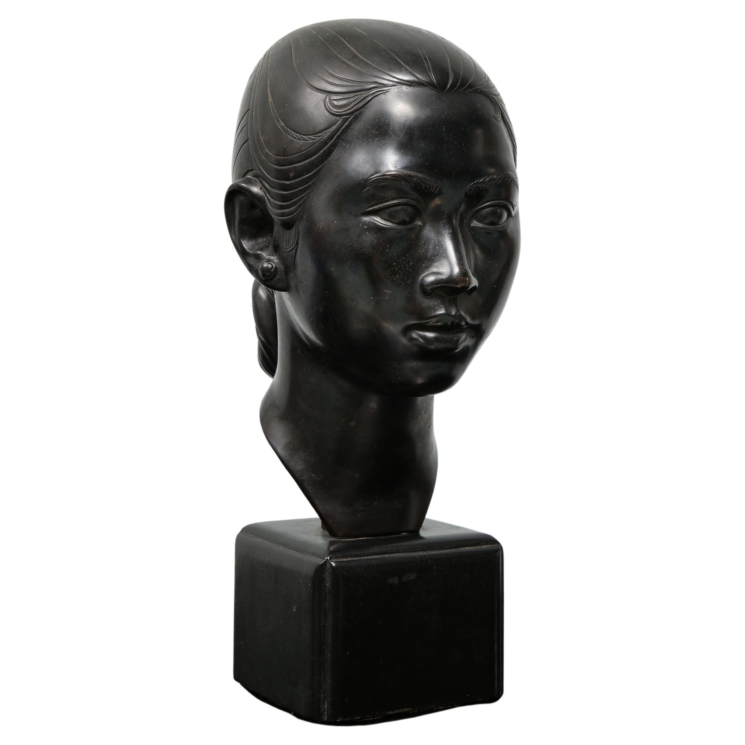 Le Van Mau (1917-2003) was a Vietnamese sculptor. This is a black patinated bronze on its original wooden cube base. It is signed on the back of the neck in Chinese characters. It is from the 40's. 