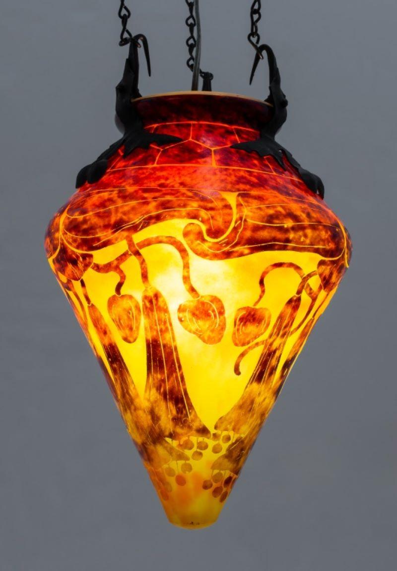 Le Verre Francais Schneider French Art Deco cameo glass shade hanging chandelier pendant lantern, circa 1900, the shade of amphora form with a tapering base and slightly flared lip in clear over mottled yellow and red glass with red cameo design of