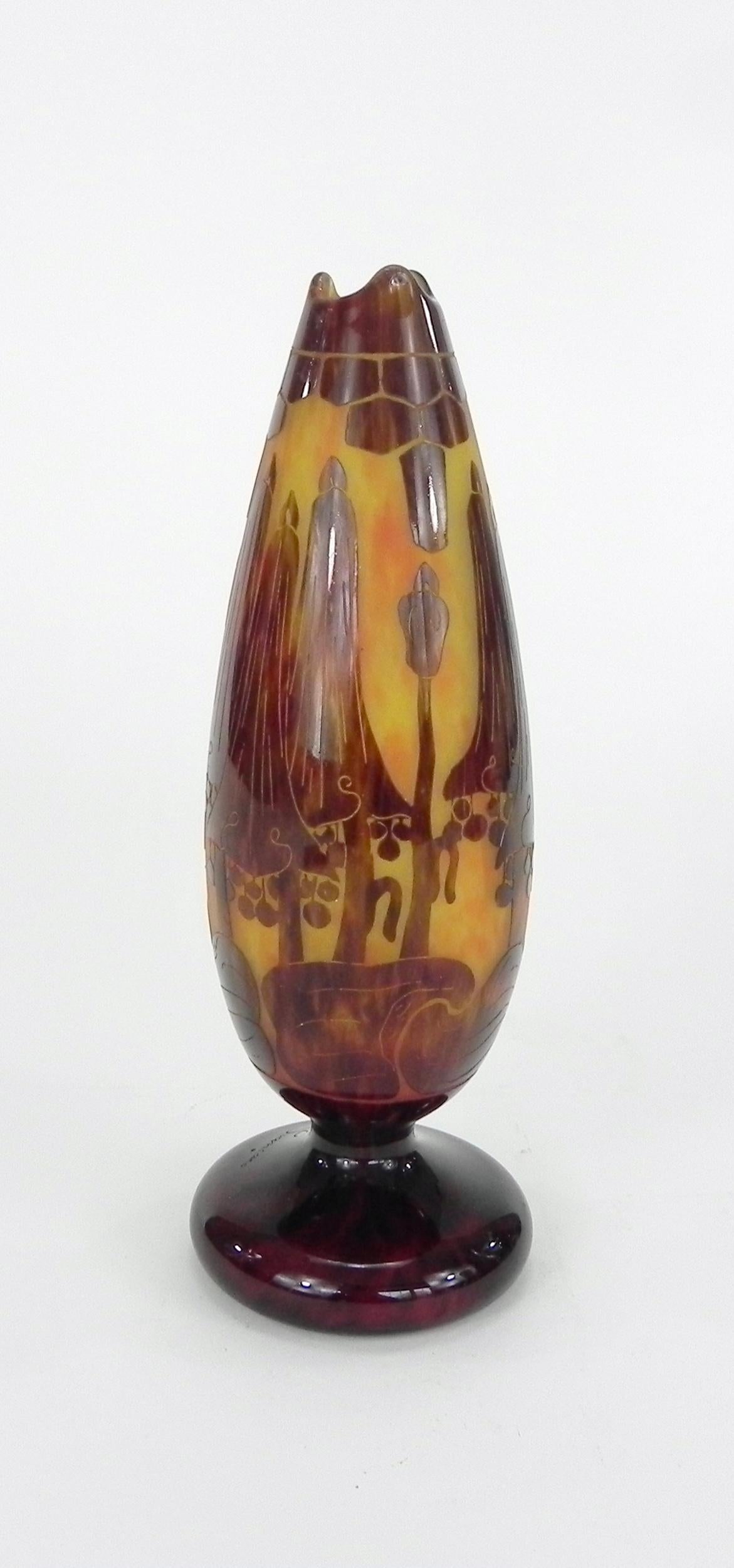 A tall “Le Verre Francais” cameo art glass vase (ca. 1922-25) decorated with bellflowers (campanulles) by the celebrated French designer Charles Schneider (1881-1953).  Executed in the Art Nouveau/Art Deco style, this acid-etched vase has the right