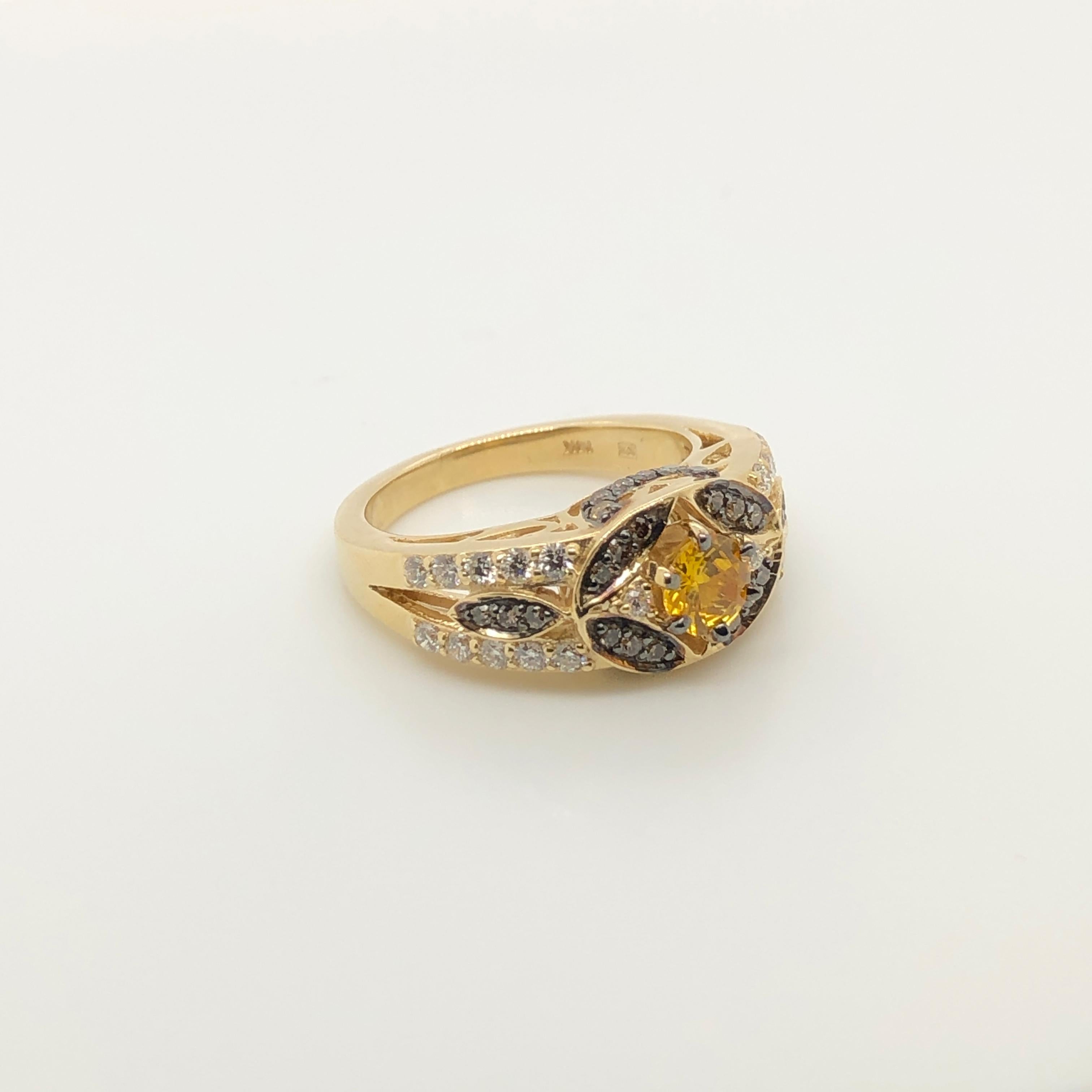 Chocolate Diamonds (1/3 ct t.w.) and Vanilla Diamonds (3/8 ct t.w.) provide sweet sparkle to this 14K yellow gold Le Vian ring centered with a 1/2 ct Yellow Sapphire.
Ring Size: 7