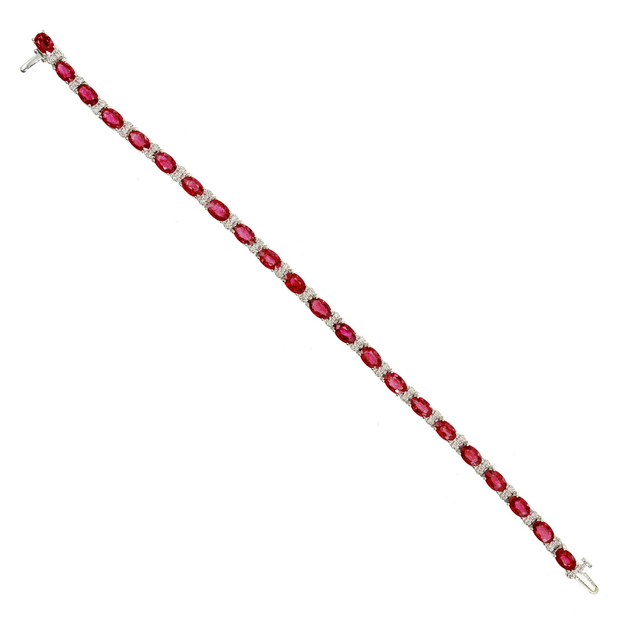 Beautiful Le Vian GIA certified ruby and diamond bracelet. 22 spectacular oval brilliant cut purple/red rubies totaling 11:00cts, spaced with 44 round brilliant cut, near colorless diamonds set in 14k white gold. 7.25 inches in length. Built in box