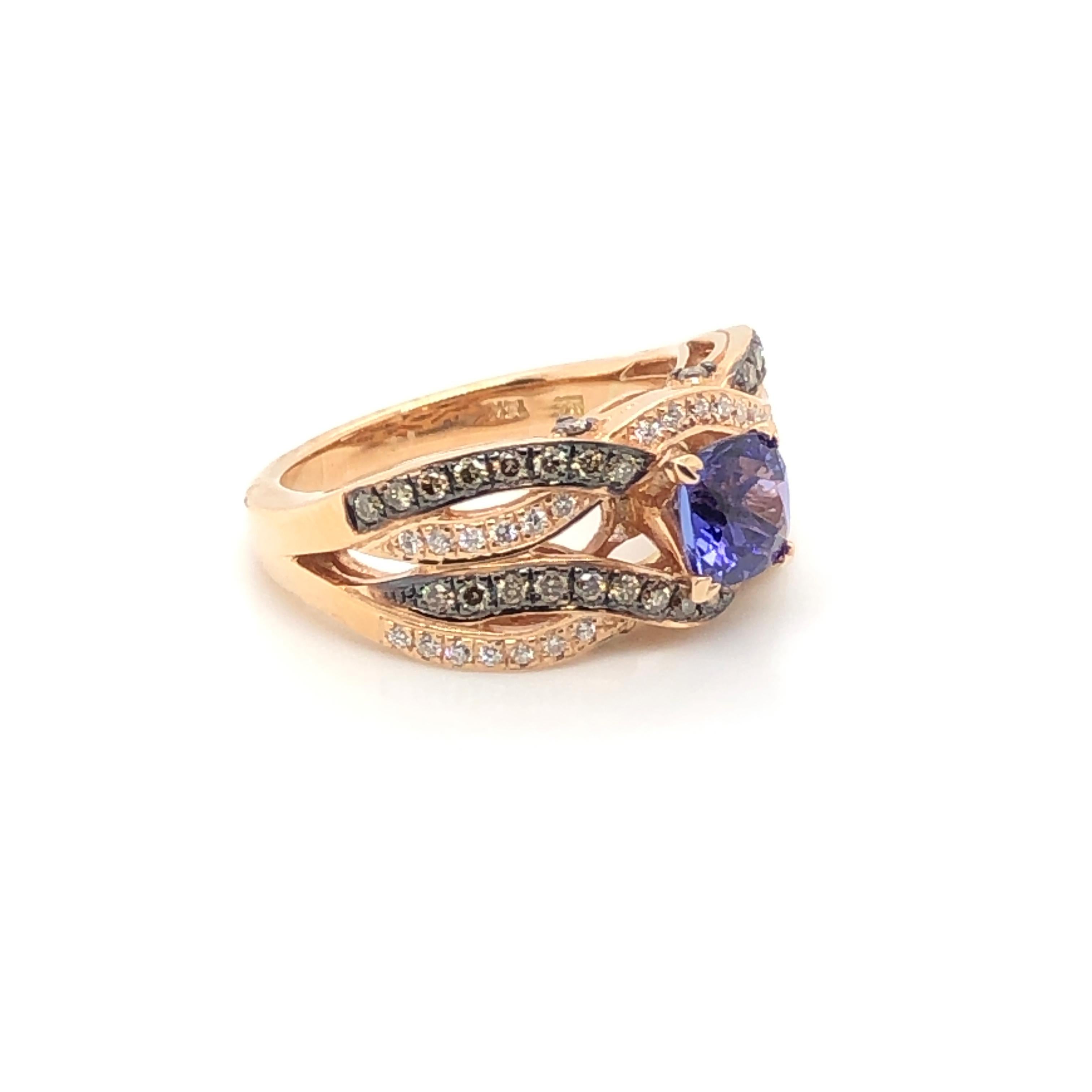 This Le Vian Bridal ring is the prefect choice for the bride who loves blue gems.  Centering this 14k rose gold ring is a beautiful 1-1/8 carat cushion cut Tanzanite that appears to rest atop a Gladiator style band with intertwining straps of