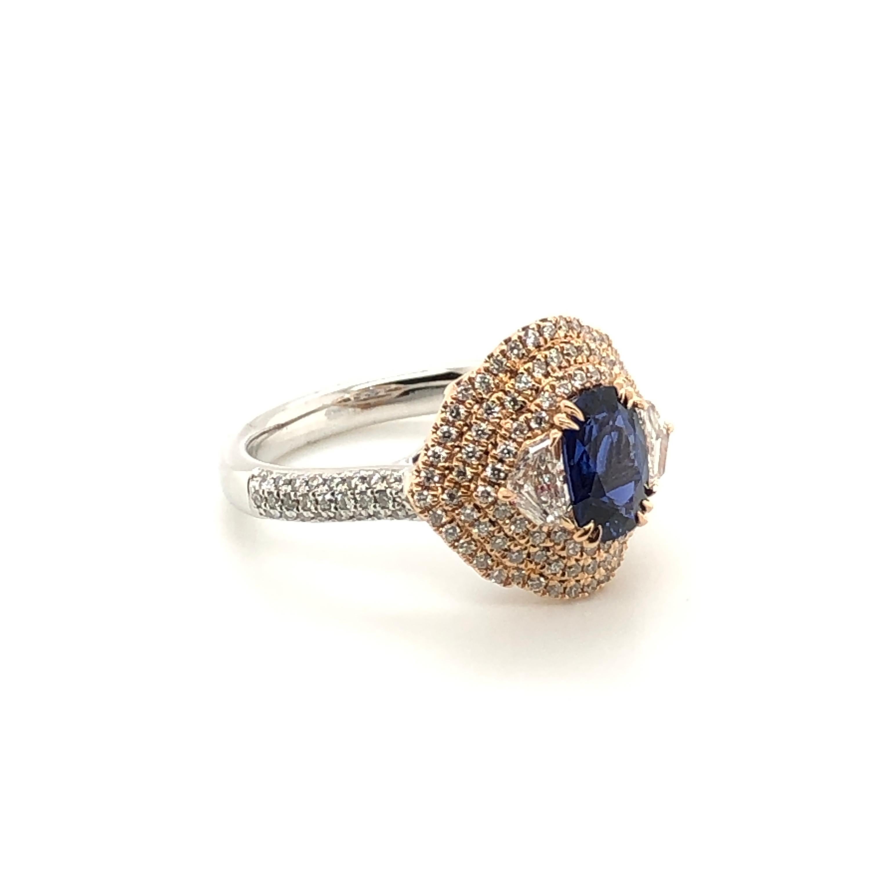 Truly a stunning design! This platinum and 18K Rose Gold ring from Le Vian Couture® features a 1-1/3 carat cushion cut Sapphire centered in between two White Diamonds all surrounded in more White Diamonds ( 3/4 ct t.w.). 
