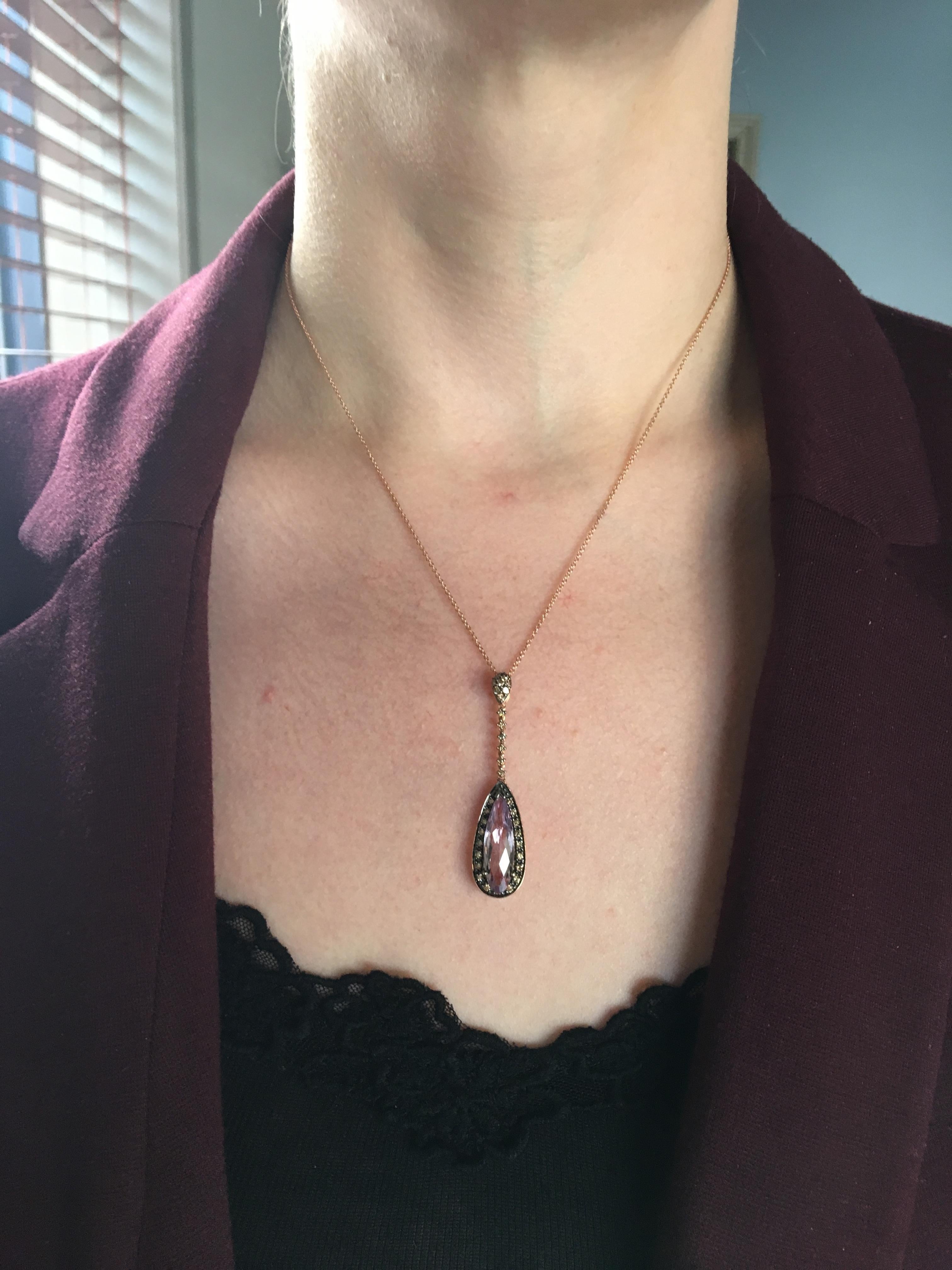 Beautiful Le Vian Amethyst Necklace Adorned with Chocolate Colored Diamonds

Designer: Le Vian
Gemstone: Elongated Pear Shaped Amethyst
Gemstone Size: Approximately 19 x 6mm
Diamond Carat Weight: Approximately .375CTW
Diamond Cut: 33 Round Brilliant