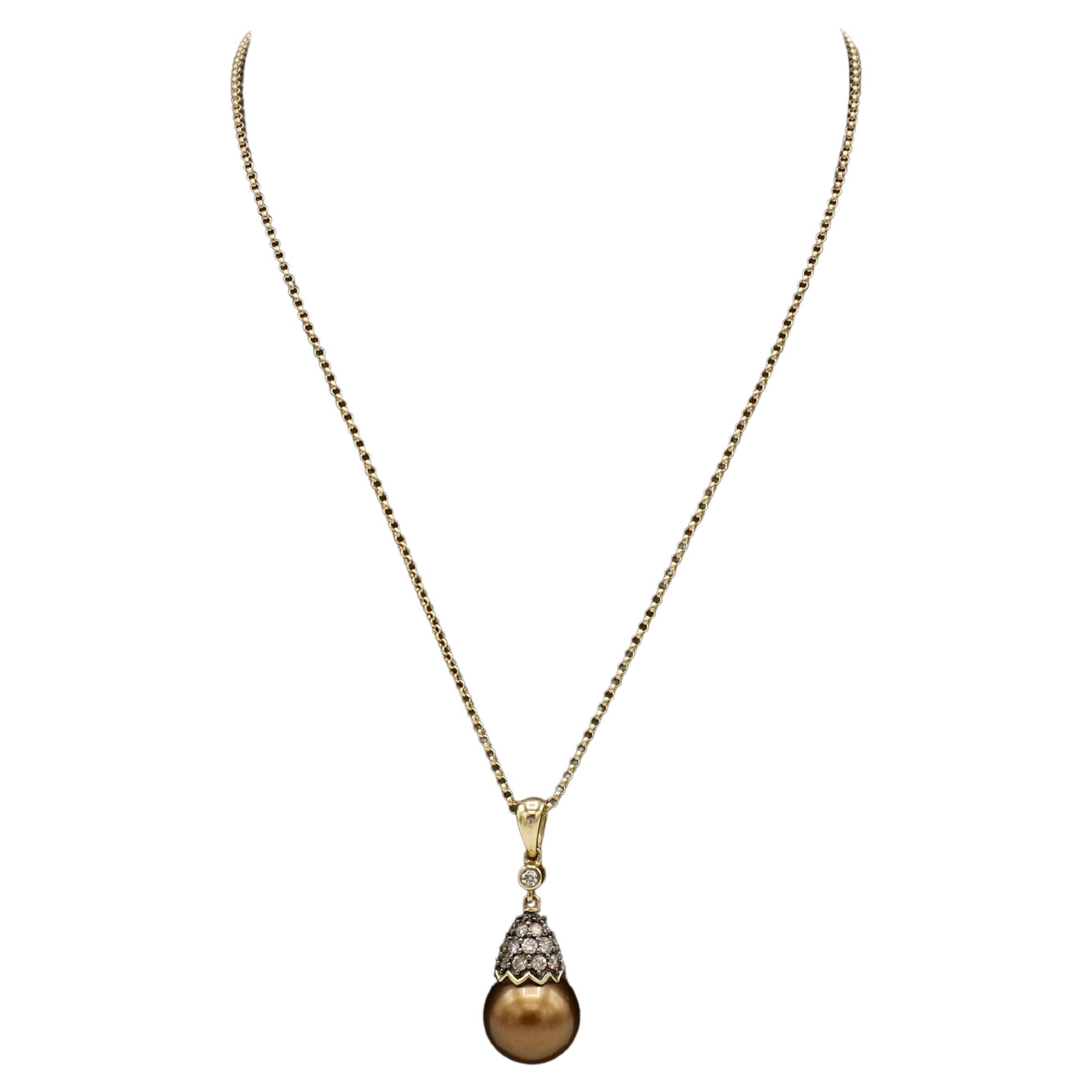 Le Vian 14 Karat Yellow Gold Brown Pearl & Natural Diamond Pendant Drop Necklace
Metal: 14k yellow gold
Weight: 4.49 grams
Diamonds: Approx. .33 CTW round natural brown & G colored SI diamonds
Chain length: 20 inches
Pendant: 28mm
Pearl: 10mm