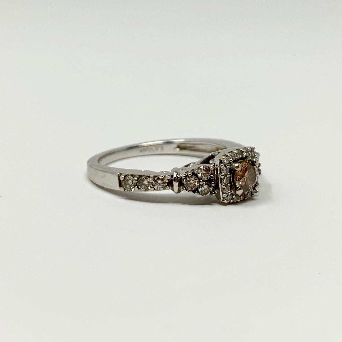 Le Vian 14k White Gold 1/2ct Chocolate and Vanilla Diamond Ring Size 6.5

Condition:  Excellent (Professionally Cleaned and Polished)
Metal:  14k Gold (Marked, and Professionally Tested)
Weight:  3g
Size:  6.5
Band Width:  1.5mm 
Ring Height (Off