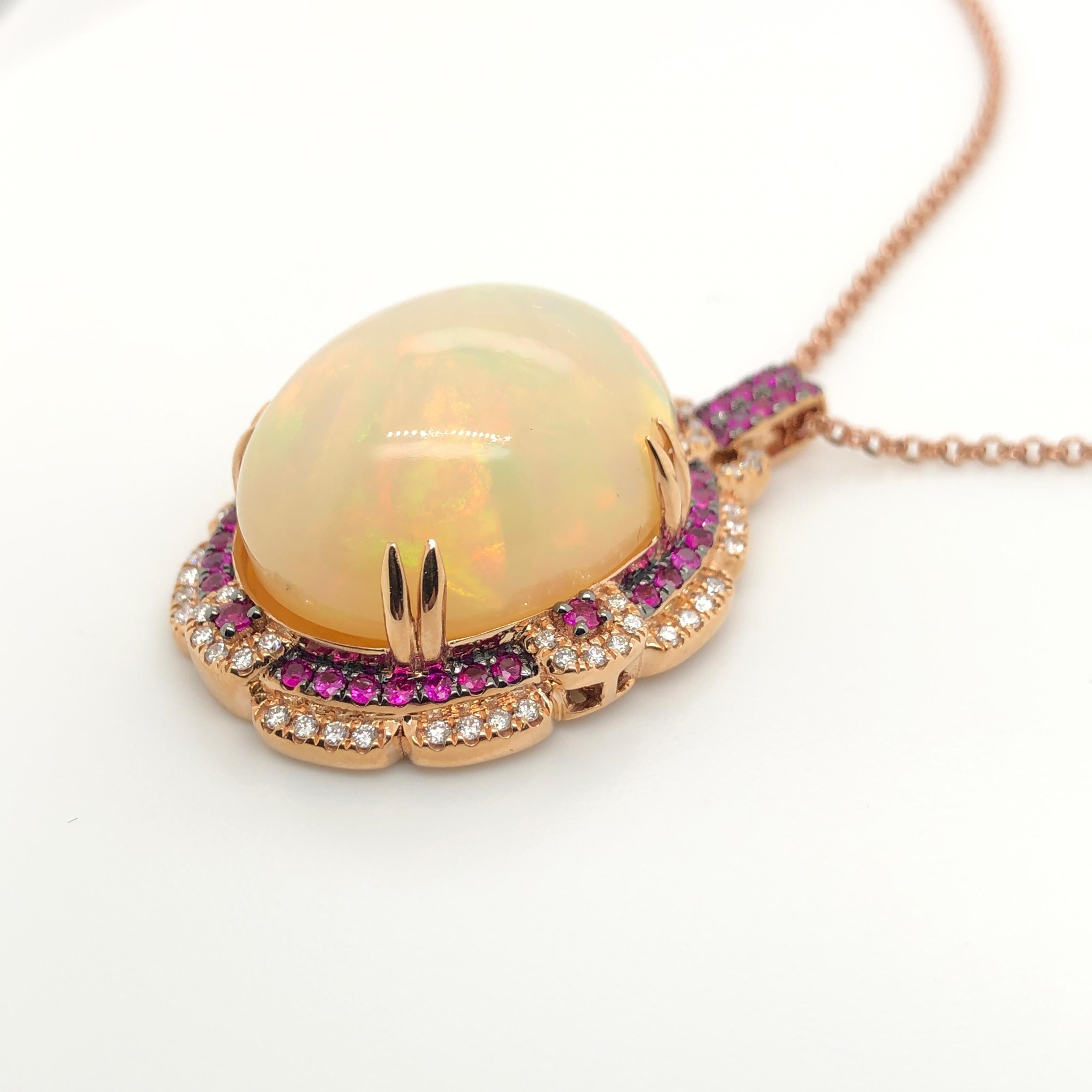 Bring out your passion for jewelry with this 18K Strawberry Gold Le Vian Couture Pendant Necklace featuring a stunning 17 carat Neopolitan Opal surrounded by 1/2 ct. tw. Passion Ruby and  2/5 ct. t.w. Vanilla Diamonds and 1/5 ct Chocolate Diamond.  