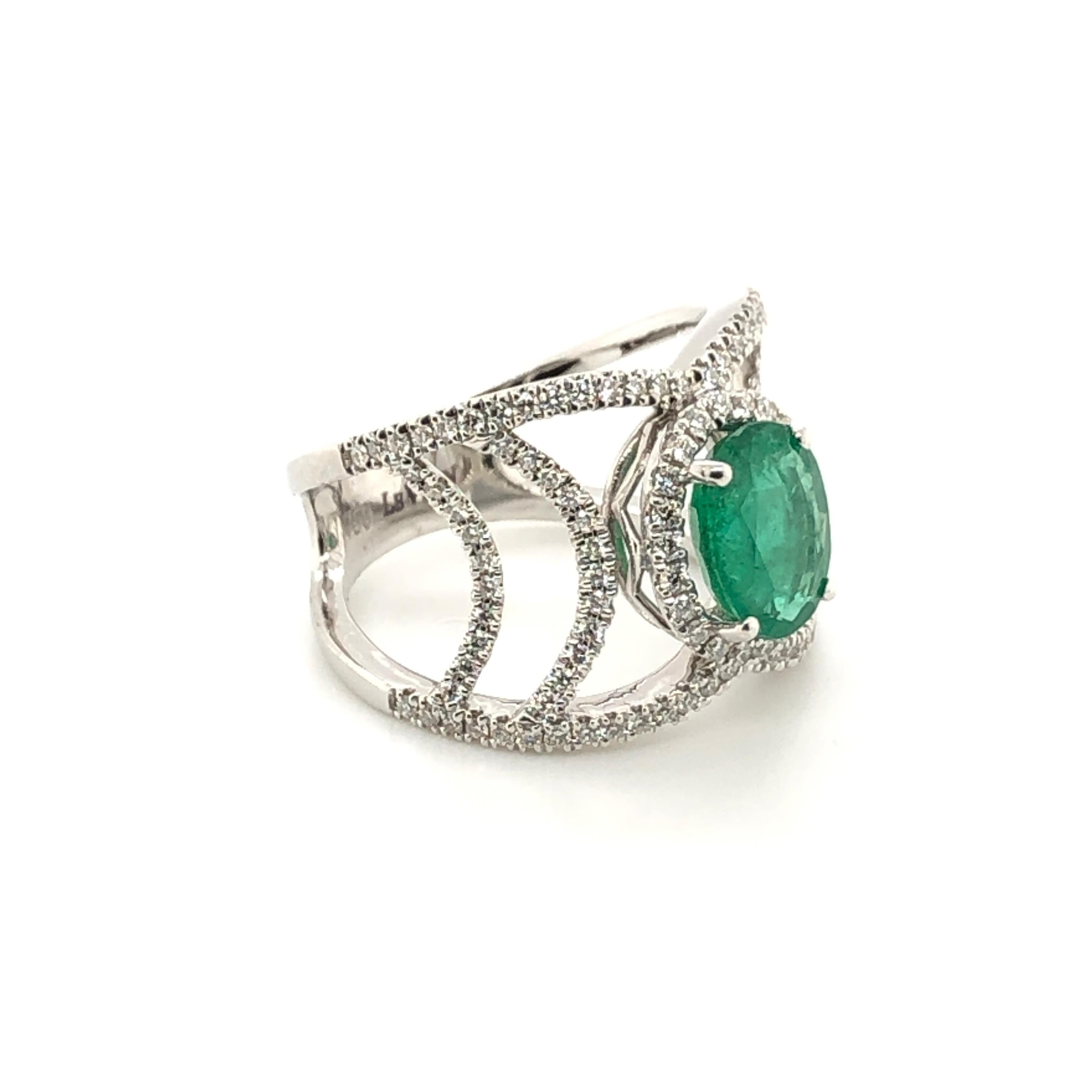 Fresh and lively with a chic and modern flare best describes this 18K White Gold ring from Le Vian Couture. At center, a 1-3/4 carat oval Emerald with open style band lined with 3/4 ct t.w. White Diamonds.

Ring Size: 6.75