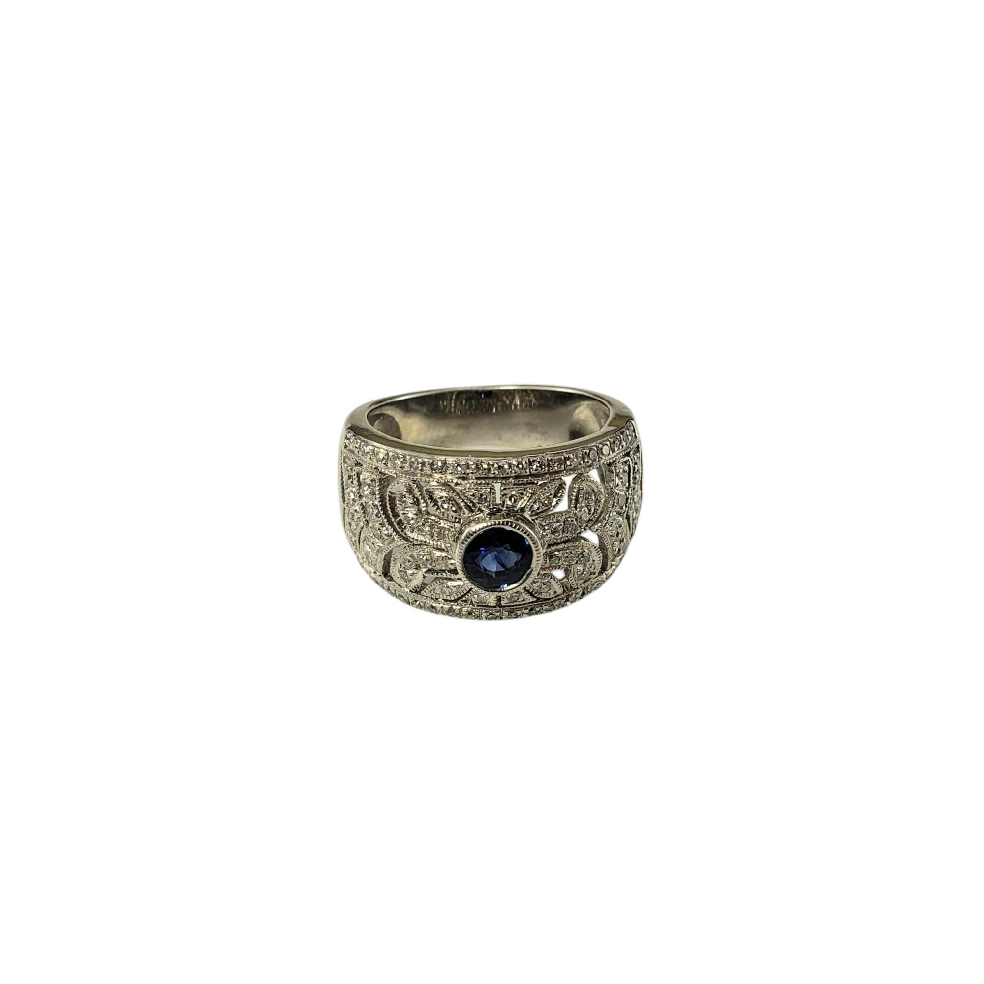 Le Vian 18K White Gold Filigree Sapphire and Diamond Band Ring Size 5.5 JAGi Certified-

This elegant Le Vian band features one round natural blue sapphire (4.3 mm) and 80 round brilliant cut diamonds set in beautifully detailed 18K white gold