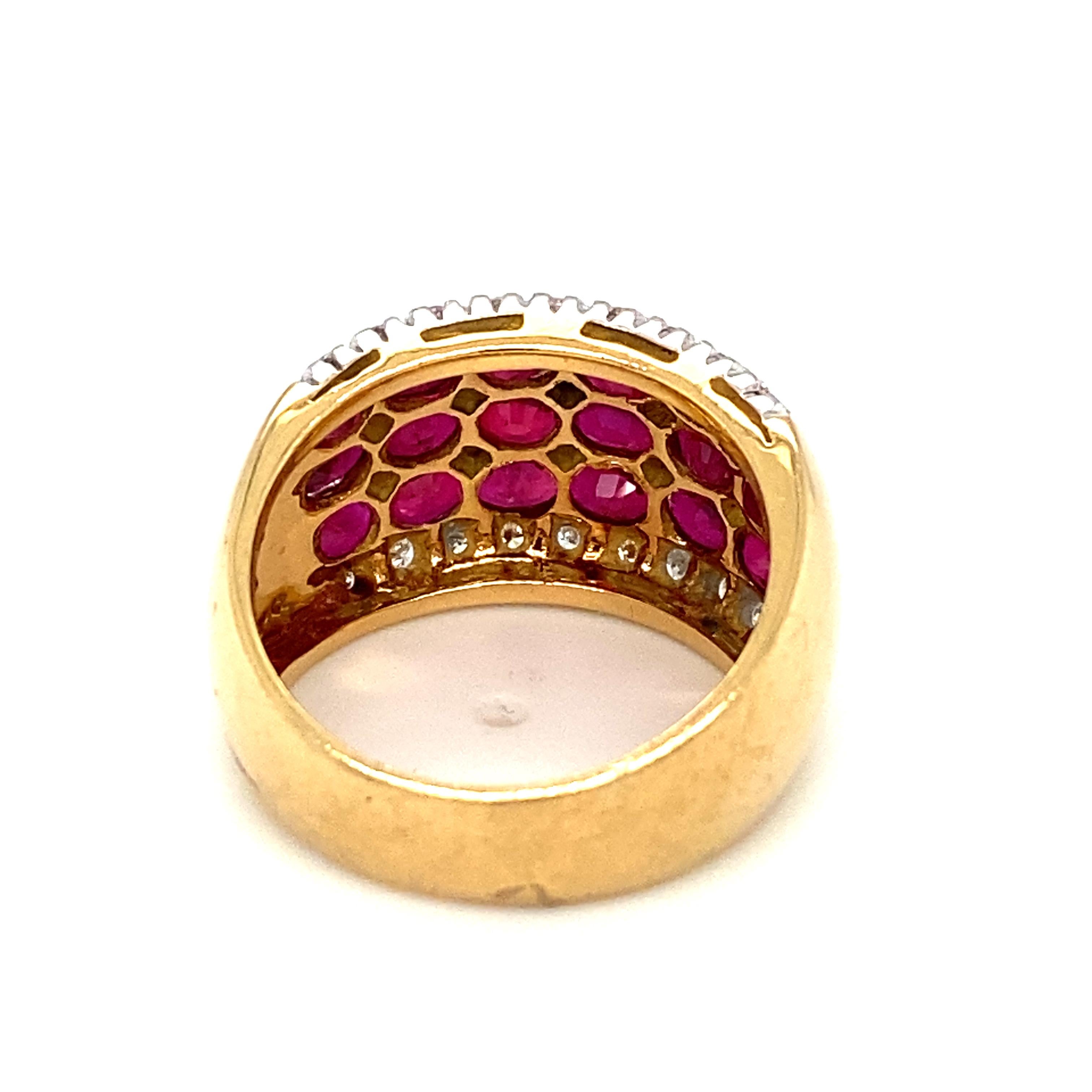 Item Details: This band by LE VIAN has oval rubies totaling two carats with accent diamonds between. Crafted in two tone 18 karat gold, It is an excellent statement designer piece!

Circa: 2000s
Metal Type: 18k yellow and white gold
Weight: 9.3