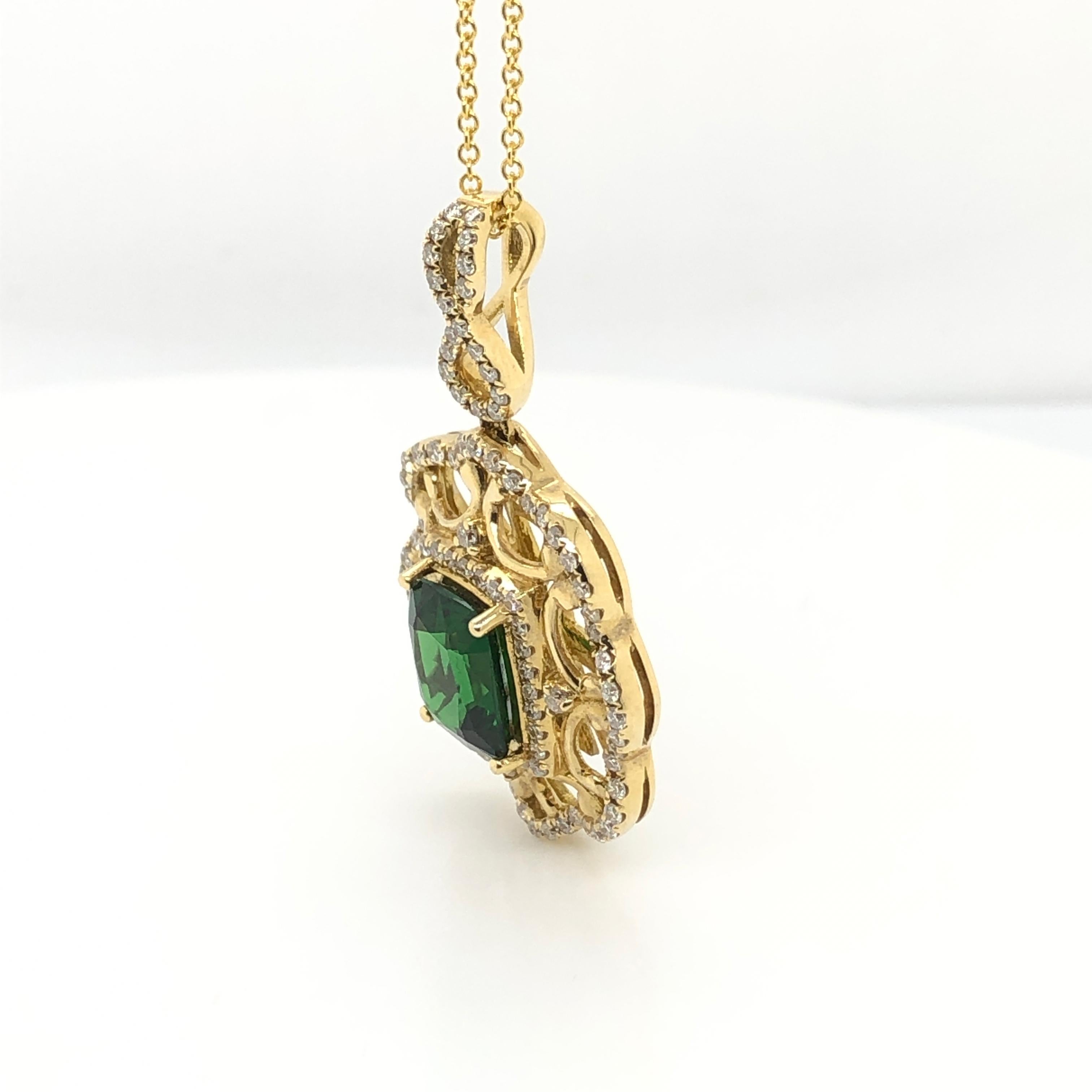 Fresh and lively best describes this 18k yellow gold pendant from Le Vian Couture centered with a 2-carat cushion cut Tsavorite nestled within a halo of Vanilla Diamonds in an elaborate scallop edged setting accented with Vanilla Diamonds, 1/2 ct