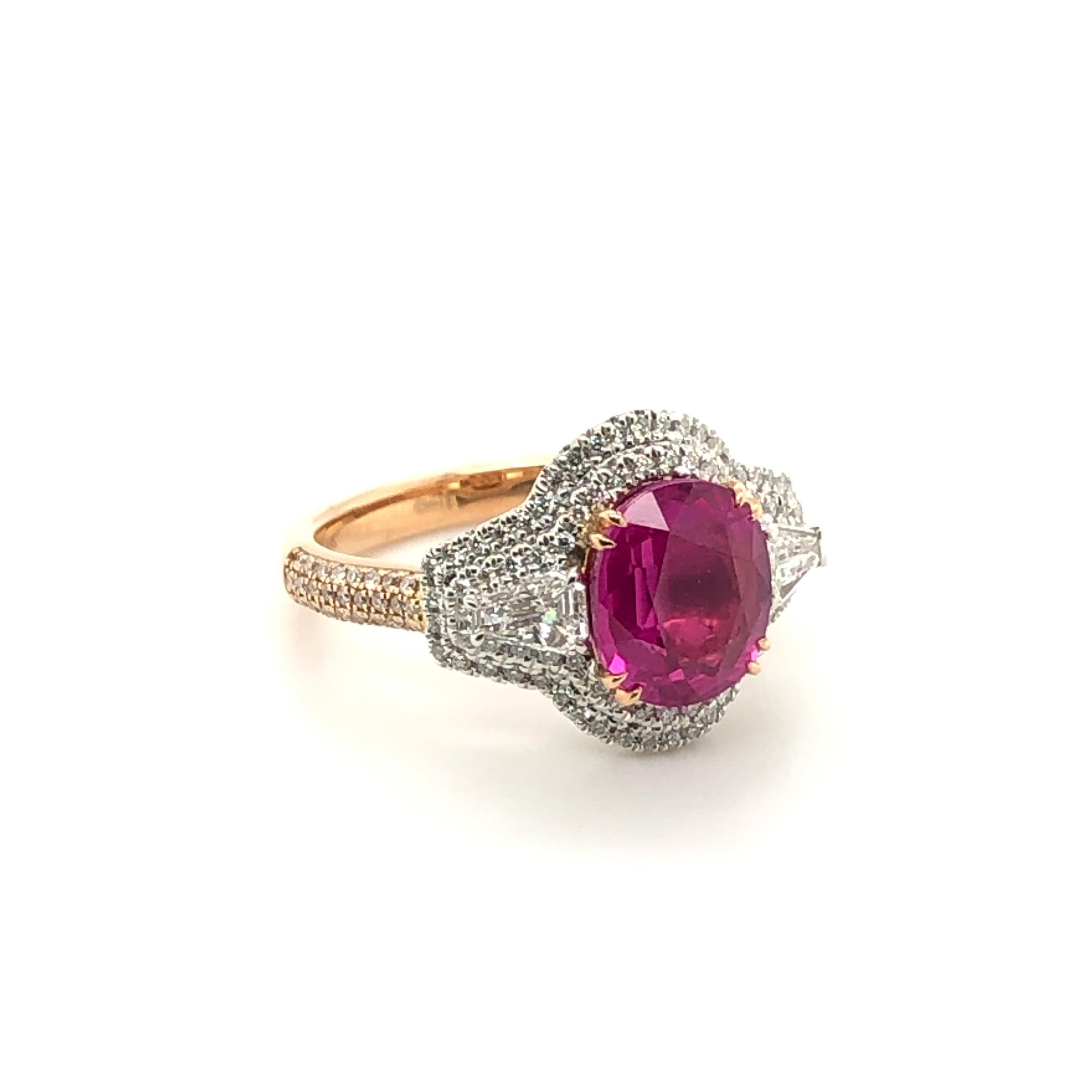 Your passion for precious gems is revealed in this stunning high profile design from Le Vian Couture.  The Platinum and 18K Two-Tone Gold ring is centered with an oval cut 3-3/8 carat Passion Ruby sided with two trapezoid cut Vanilla Diamonds with