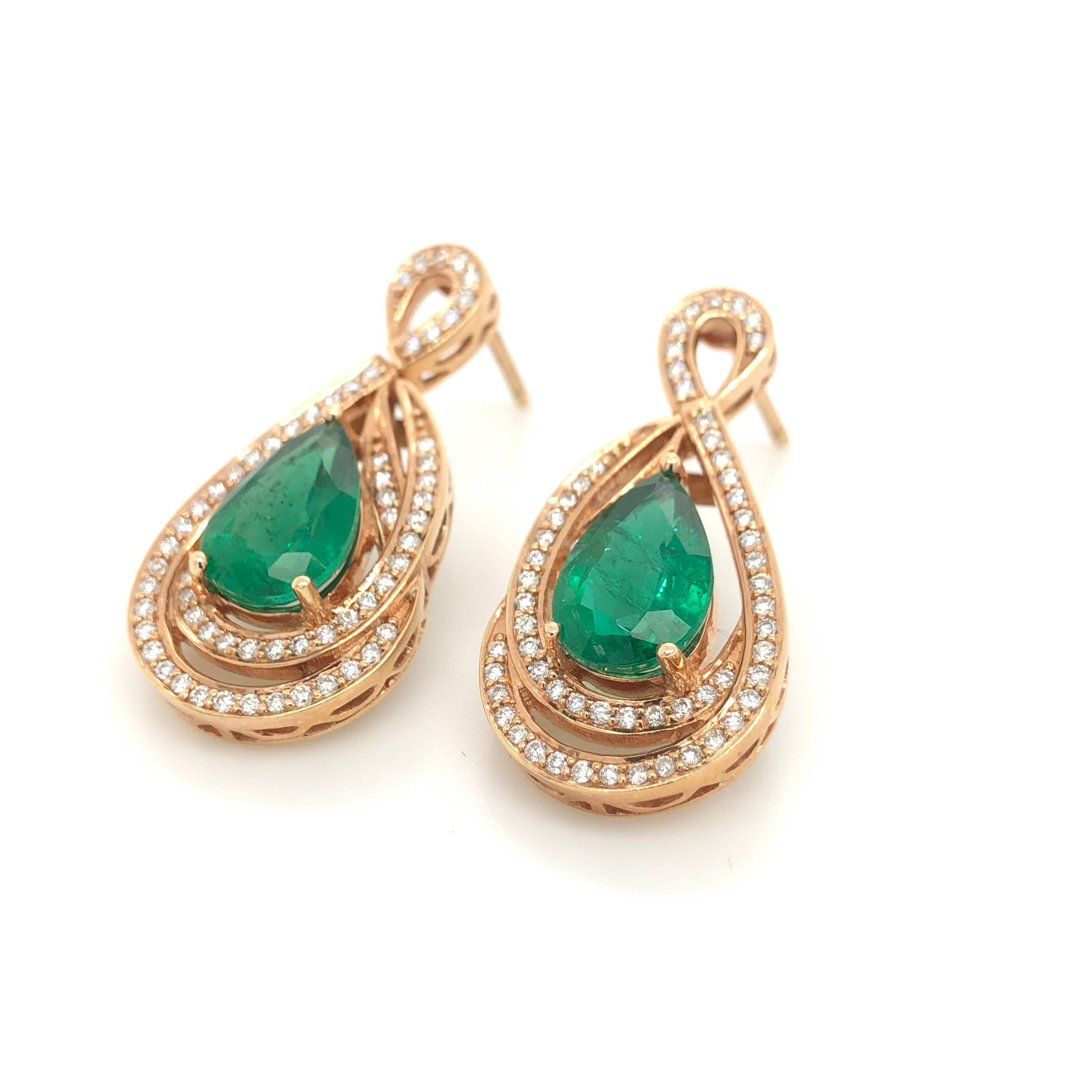 Your passion for precious gems are realized in these dazzling 18K Strawberry Gold drop earrings from Le Vian Couture Earrings.  Each earring features a pear-shaped Costa Smeralda Emerald weighing 2-1/4 carats accented with Vanilla Diamonds (5/8 ct.