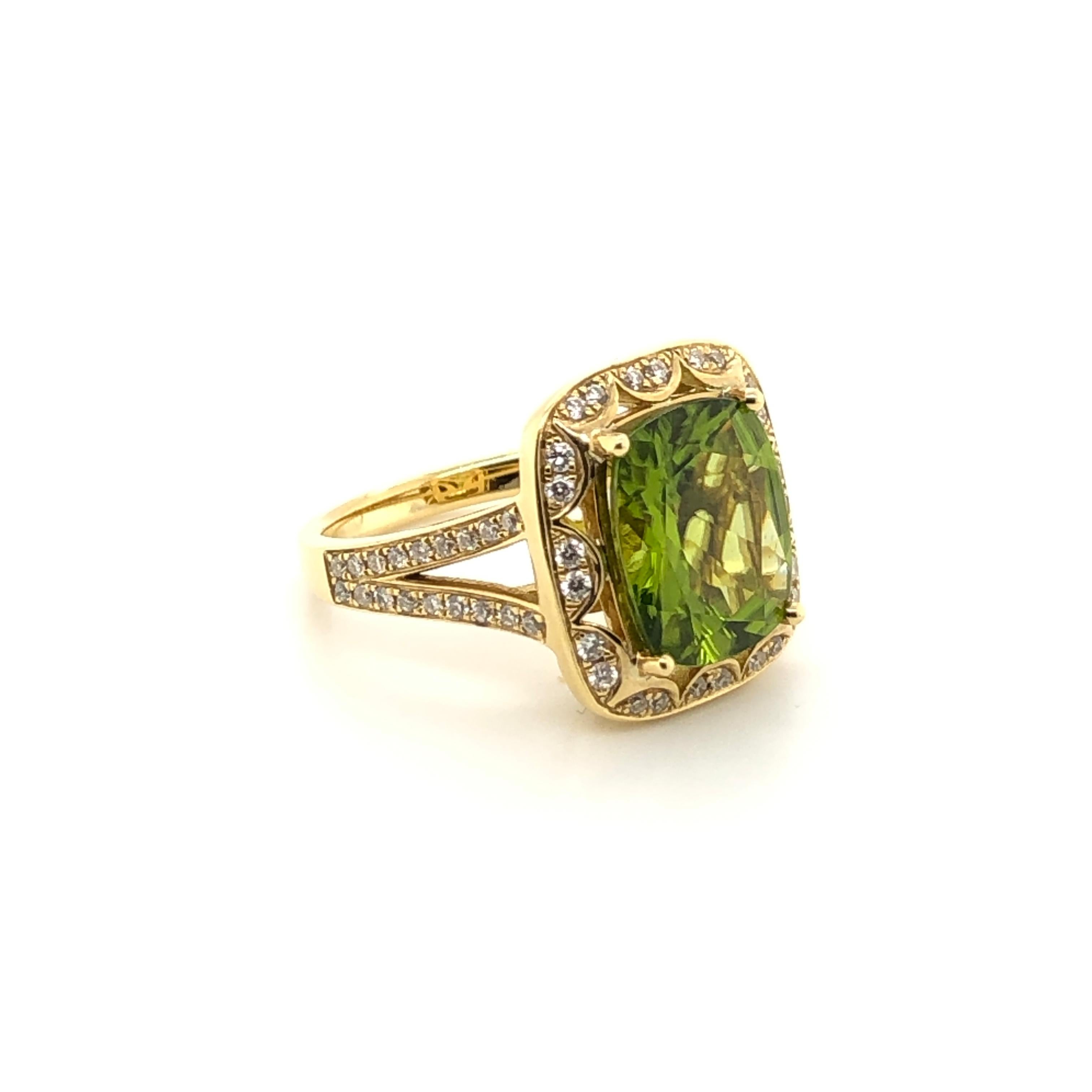The gorgeous greens of nature are revealed in this 18K Honey Gold ring from Le Vian Couture. At center, a 5-carat cushion cut Green Apple Peridot  framed within a scalloped halo accented with 1/3 ct t.w. Vanilla Diamonds.

Ring Size: 7

Le Vian 5