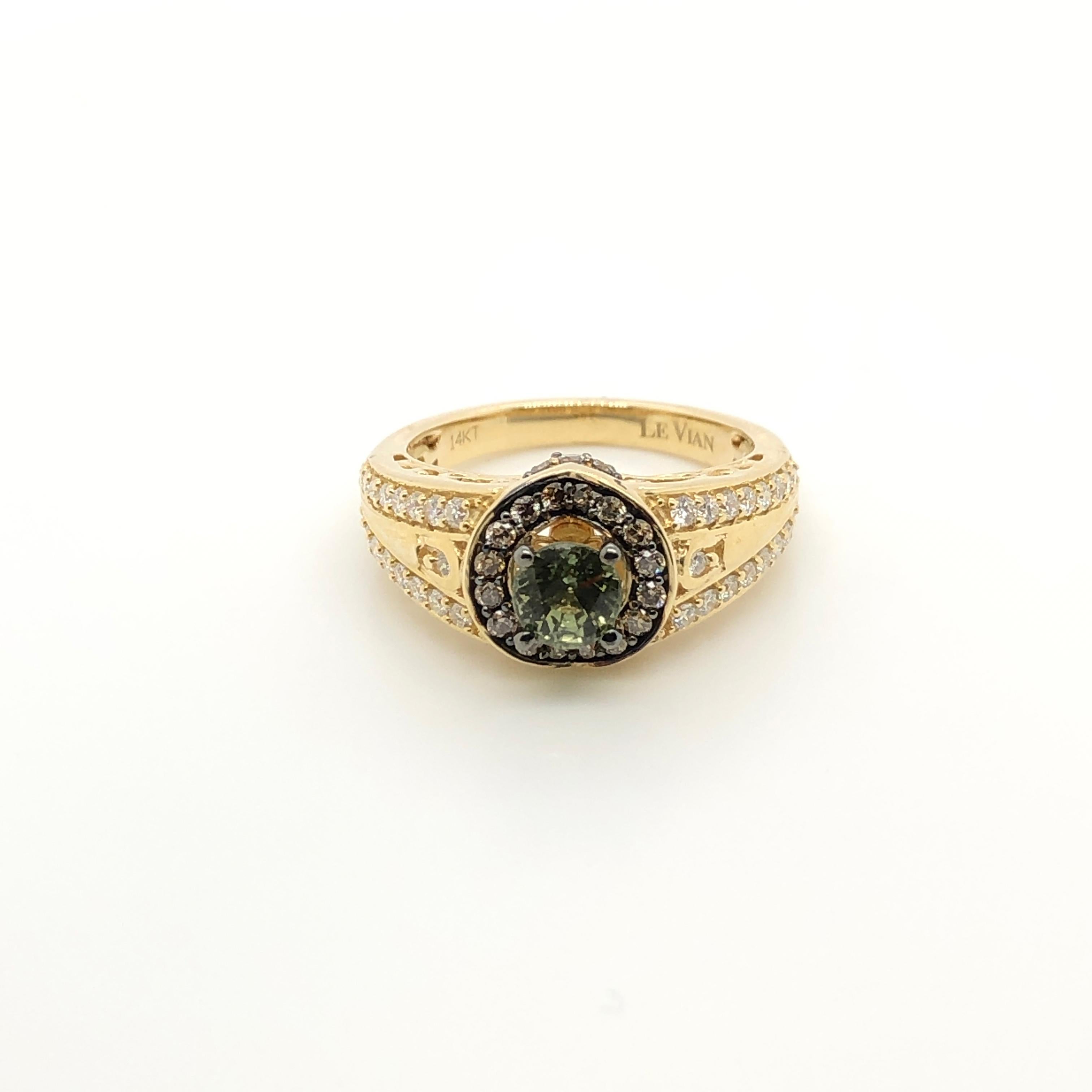 Nature's gorgeous greens are the inspiration for this 14k yellow gold Le Vian Bridal ring featuring a 7/8-carat Green Sapphire surrounded by 3/8 ct. t.w. Chocolate Diamonds and 3/8 ct t.w. Vanilla Diamonds accenting the band.
Ring Size: 7