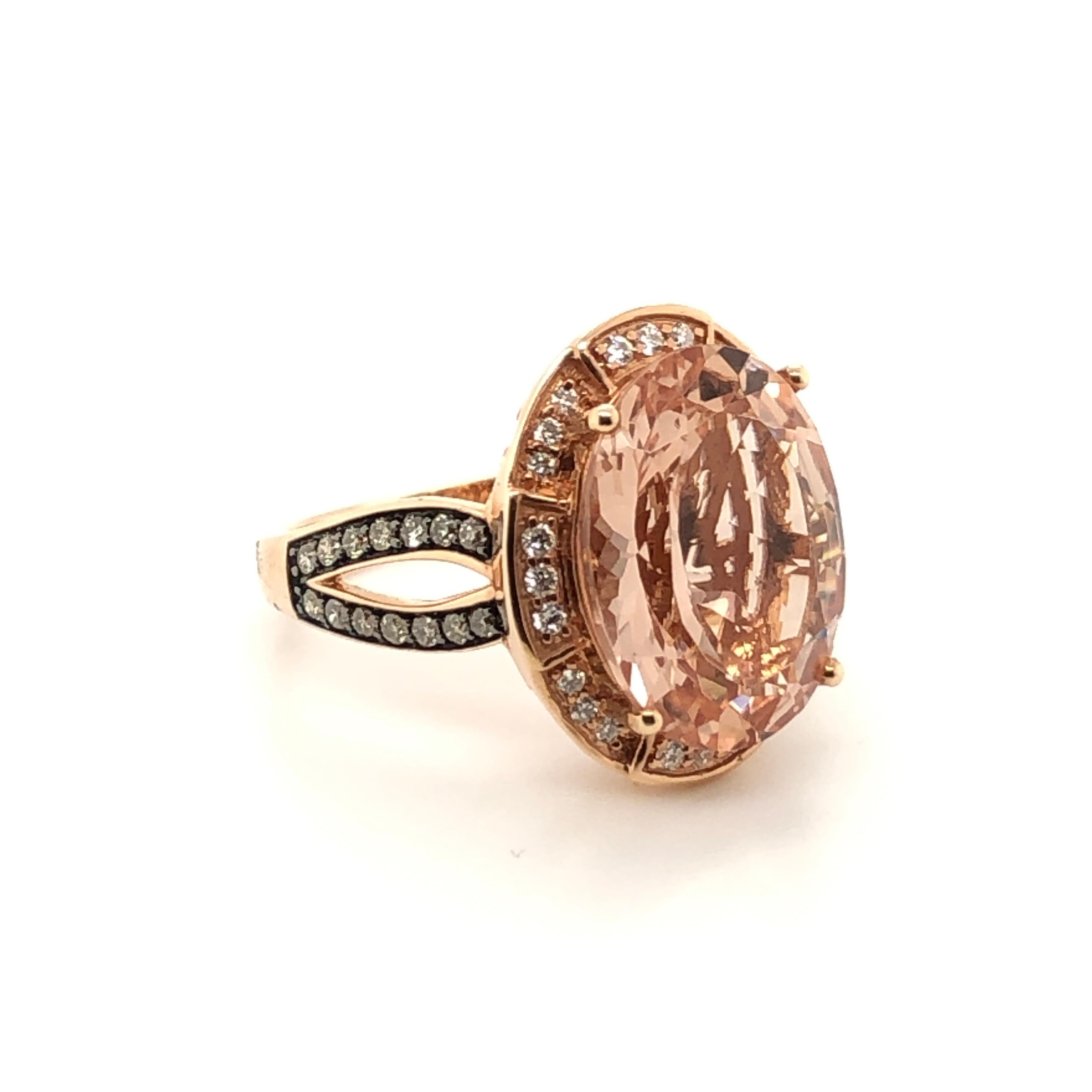 Blushing with flavor, this 14K Strawberry Gold ring from Le Vian Chocolatier features a 6 -7/8 carat oval Peach Morganite deliciously accented with 1/4 ct t.w. Chocolate Diamonds and  1/5 ct t.w. Vanilla Diamonds.

Ring Size: 7.25

Le Vian 7 Carat