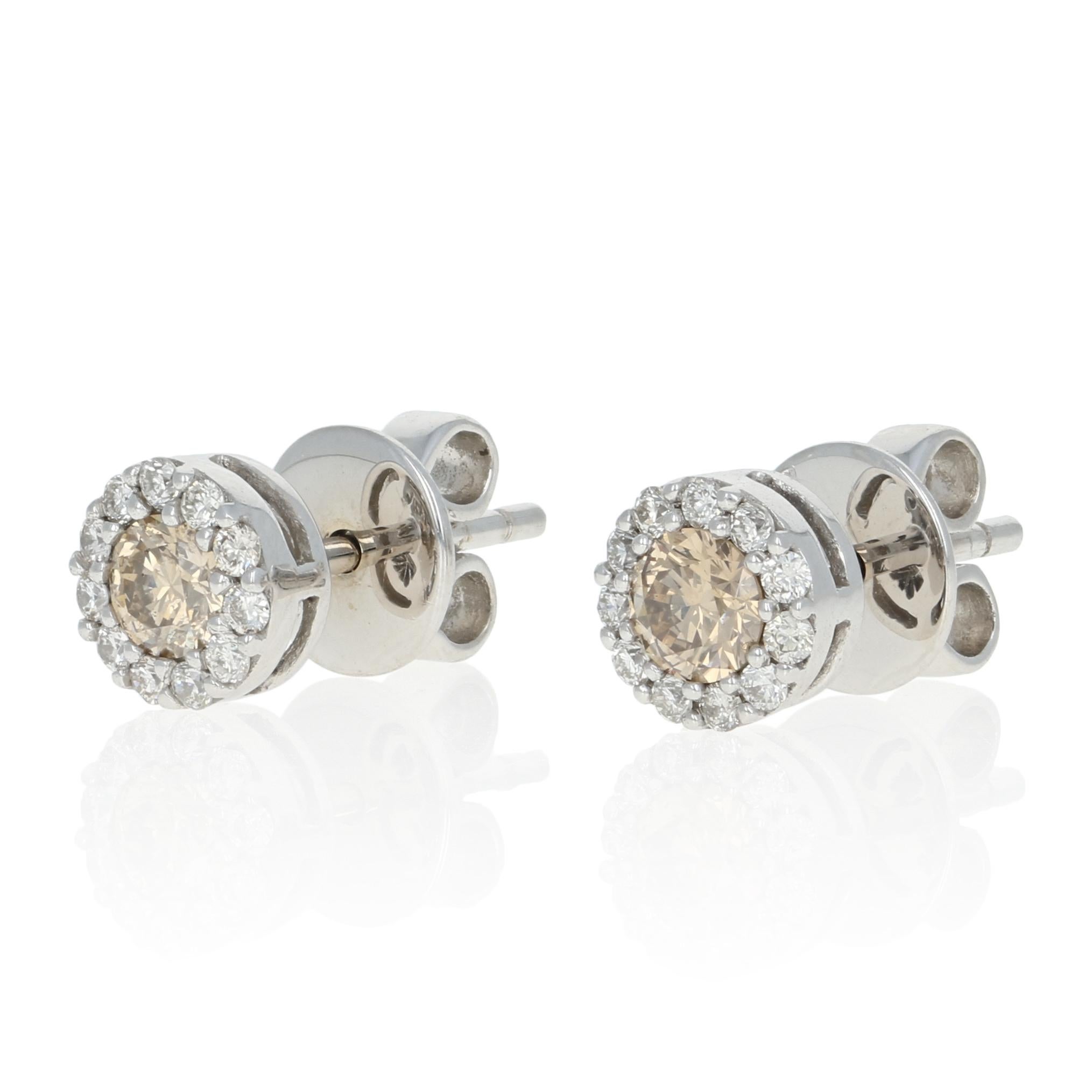 Treat yourself to something sweet that sparkles! Beautifully created by Le Vian, these 14k white gold stud earrings showcase luminous chocolate diamonds framed by glittering vanilla diamond halos. These designer earrings originally retail for $2,600