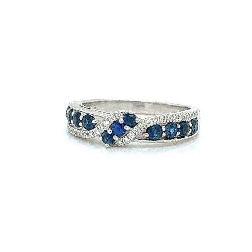 Le Vian Blue Sapphire and Diamond 14k White Gold Ribbon Band Ring Size 7

Condition:  Excellent Condition, Professionally Cleaned and Polished
Metal:  14k Gold (Marked, and Professionally Tested)
Gemstone:  .68ctw Bright Blue Sapphires
Diamonds: 