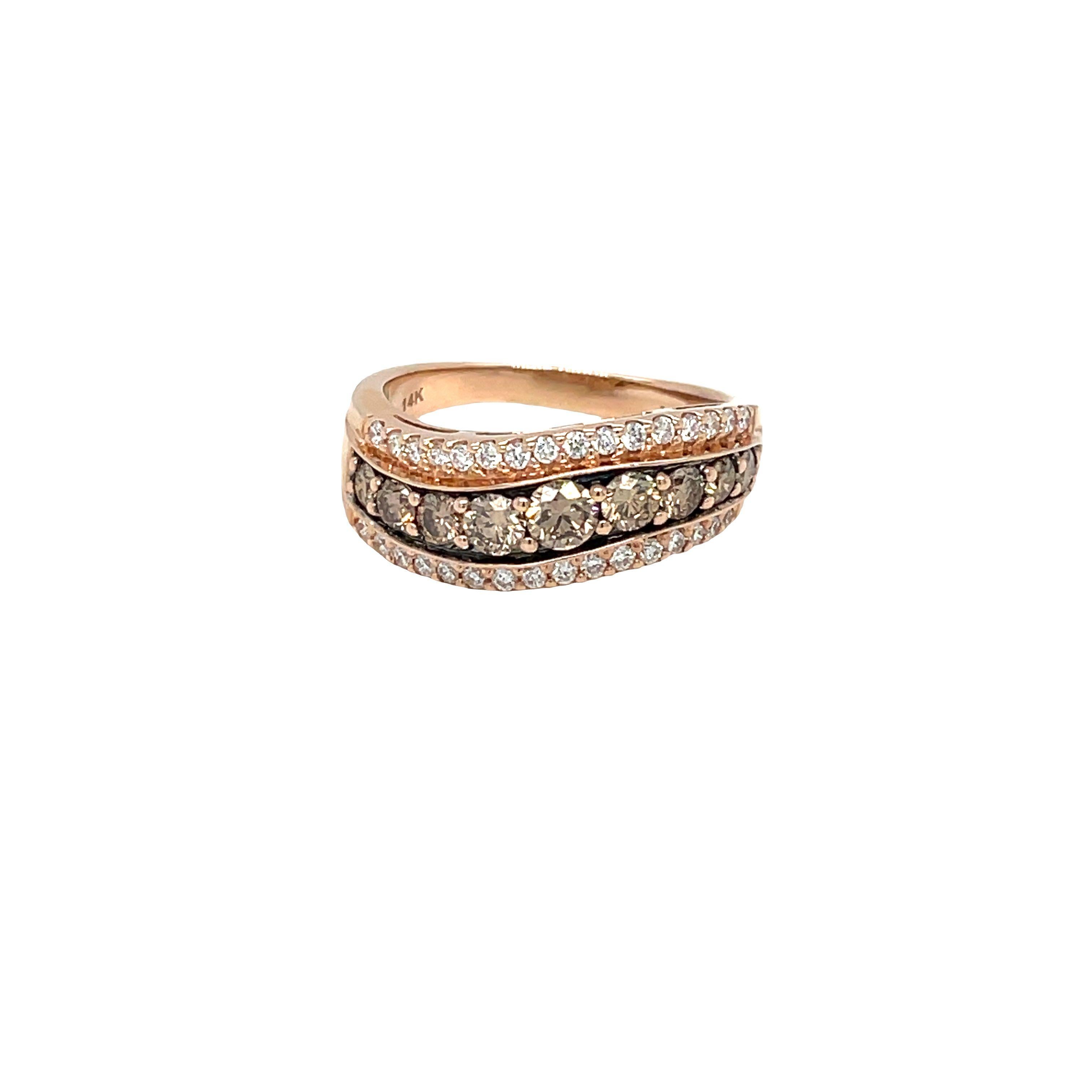 The alternating rows of chocolate and white diamonds create a stunning contrast in color and shine, making this ring a trendy and eye-catching piece. 

Le Vian's chocolate diamond wave ring is a mesmerizing piece that showcases waves of sparkle in