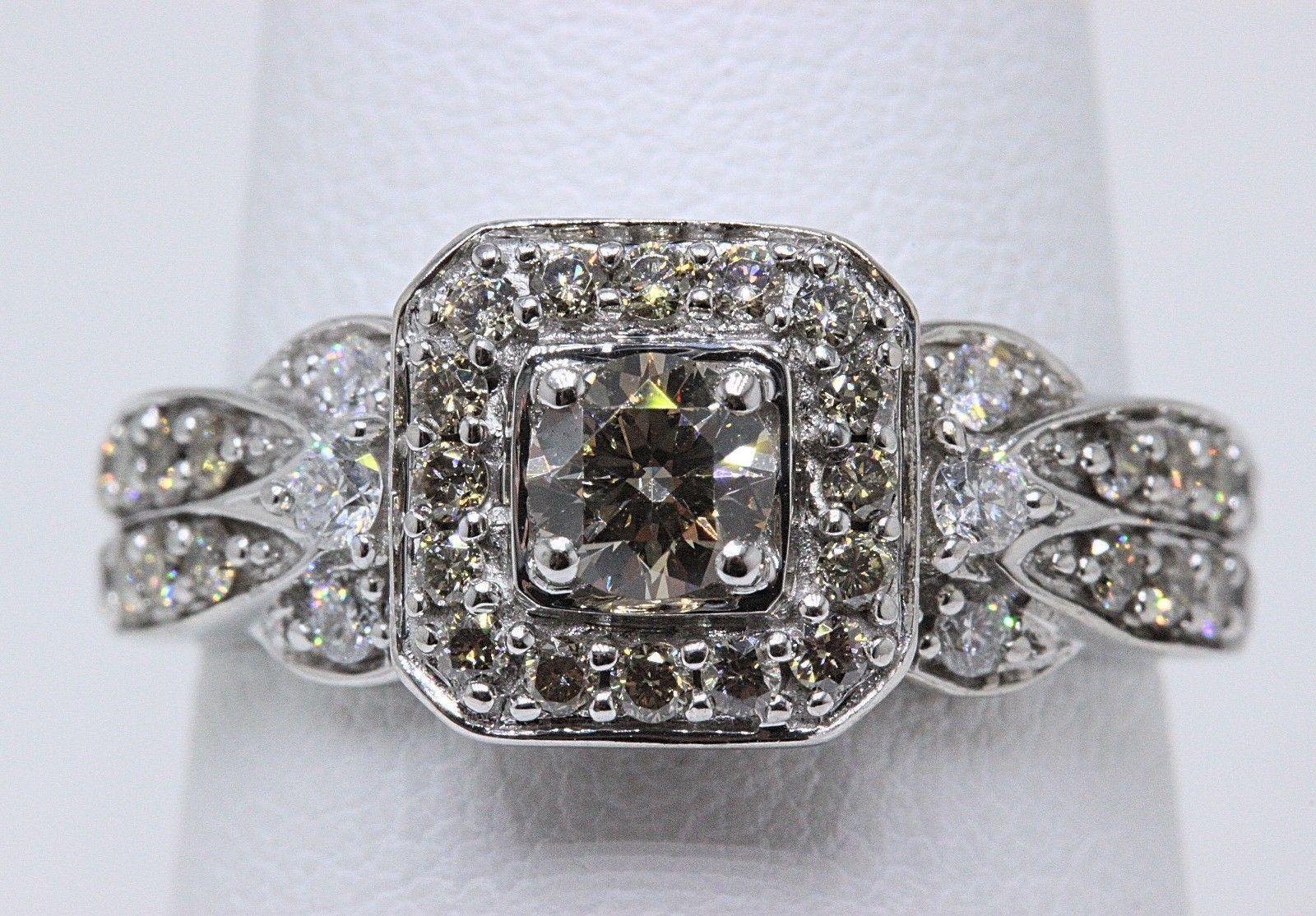 Le Vian CHOCOLATE COLLECTION

Style:  Halo with Diamond Band Engagement Ring
Sku Number:  22665309
Metal:  White Gold 14K
Size: 7.75 - sizable
Total Carat Weight:  0.75 TCW
Diamond Shape:  Round Diamond 0.25 CTS
Diamond Color & Clarity: Chocolate /