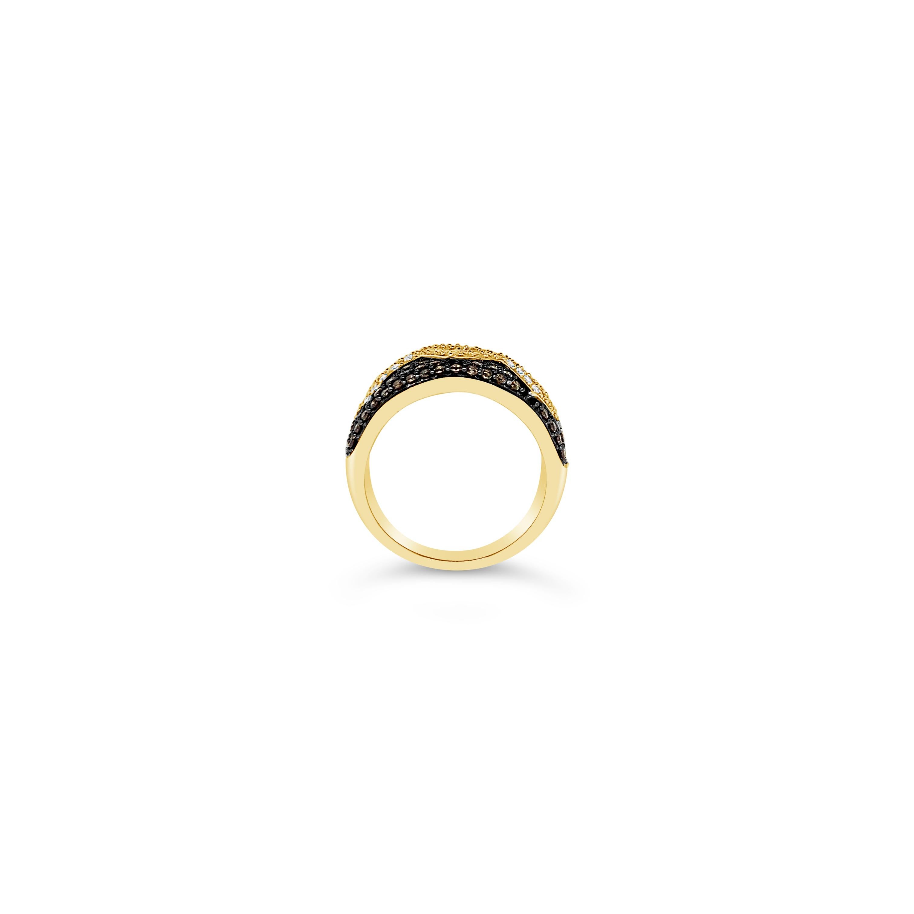 Le Vian Chocolatier® Ring featuring .65 cts. Chocolate Diamonds®, .35 cts. Vanilla Diamonds® set in 14K Honey Gold™

Diamonds Breakdown:
.65 cts Brown Diamonds
.35 cts White Diamonds

Gems Breakdown:
None

Ring may or may not be sizable, please feel