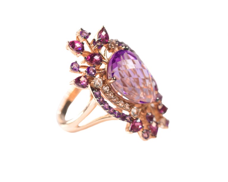 Le Vian Crazy Collection Multi-Stone Ring in 14 Karat Strawberry Rose Gold - 8.0 carat total weight

Features 7.0 carat total weight pear and round-cut Purple amethyst, 1.0 carat total weight pear-cut rhodolite and white topaz accents. All gemstones
