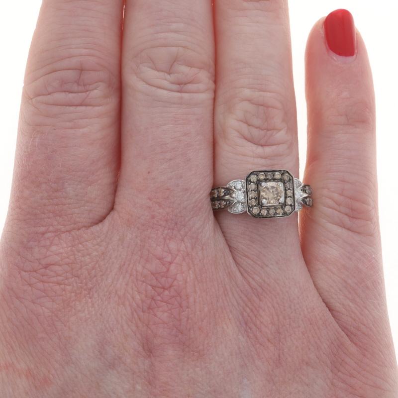 Retail Price: $2500

Size: 6 3/4
Sizing Fee: Up 2 sizes for $50 or Down 1 size for $40

Brand: Le Vian

Metal Content: 14k White Gold

Stone Information

Natural Diamond
Carat(s): .30ct
Cut: Round Brilliant
Color: Chocolate
Clarity: I1

Natural