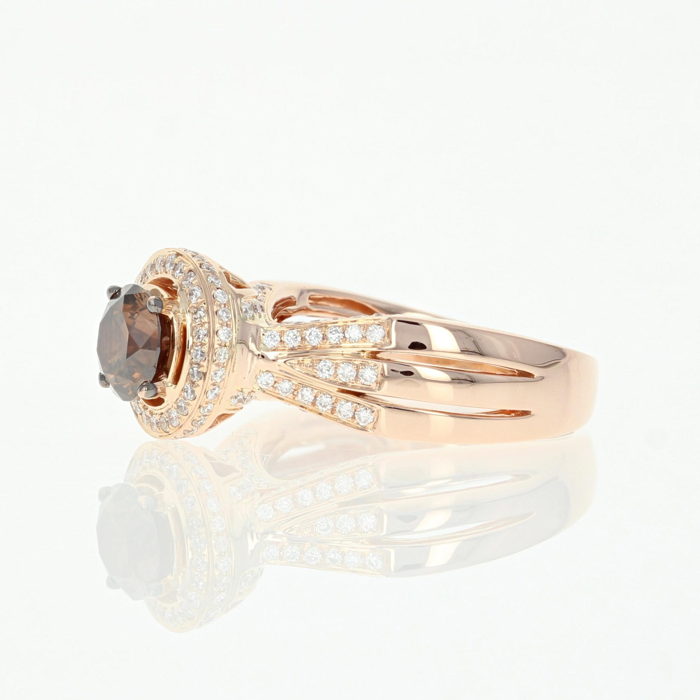 Treat yourself to the well-deserved gift of Le Vian jewelry! Crafted in 18k rose gold, this designer ring showcases a decadent chocolate brown diamond solitaire encircled by a shimmering white diamond halo. Even more radiant diamond accents grace