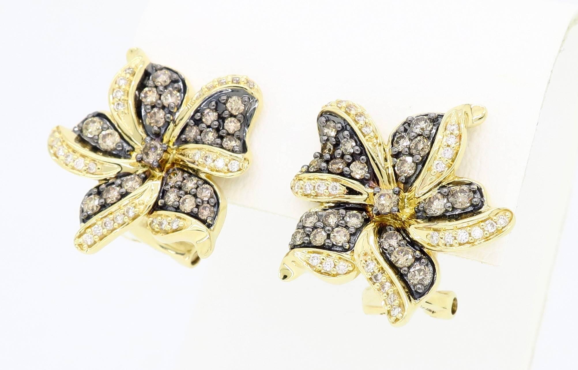 These beautiful flower shaped earrings designed by LeVian feature approximately 1.50CTW of diamonds.

Designer: LeVian
Gemstone: Diamond
Diamond Carat Weight: Approximately 1.50CTW
Diamond Cut: 98 Round Brilliant 
Color: 44 Chocolate Color, 54