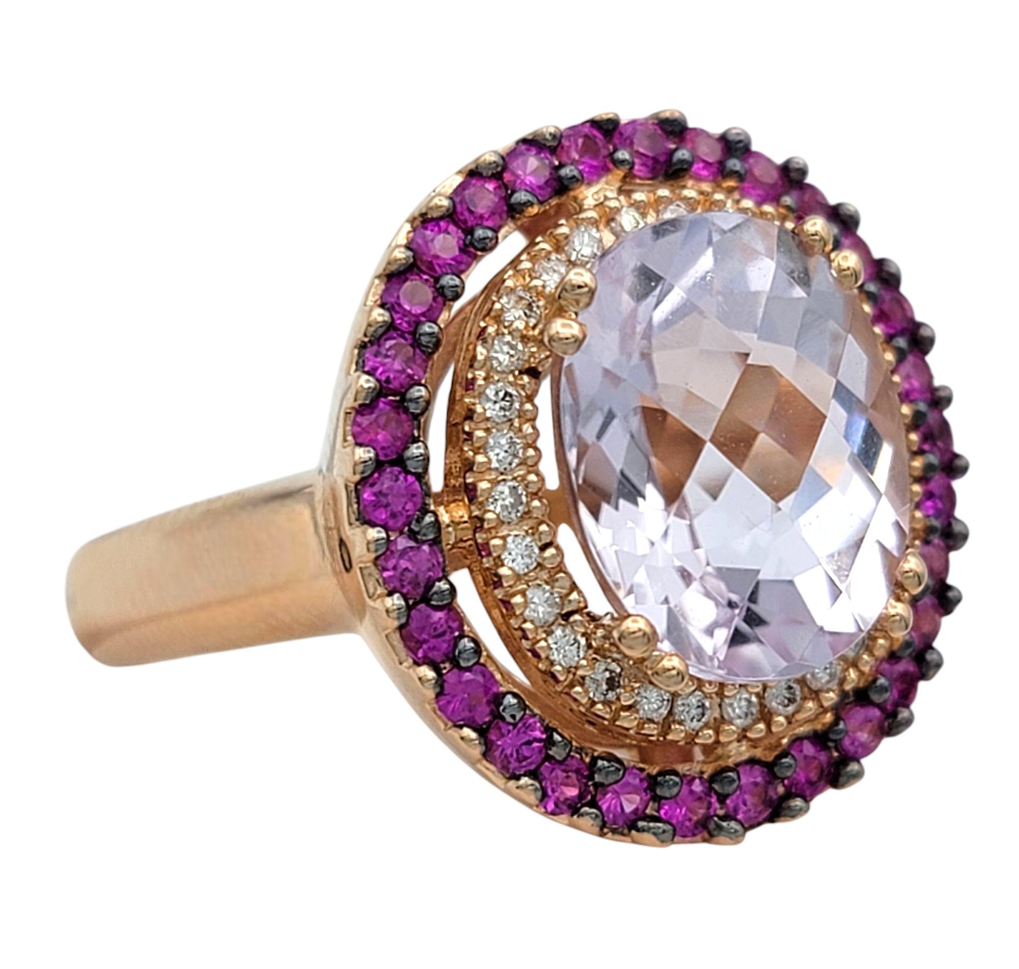 Ring Size: 7

A stunning display of color and brilliance, this Le Vian kunzite, pink sapphire, and diamond ring is a breathtaking statement piece. Crafted in 14 karat rose gold, this exquisite design features a captivating oval-cut kunzite,