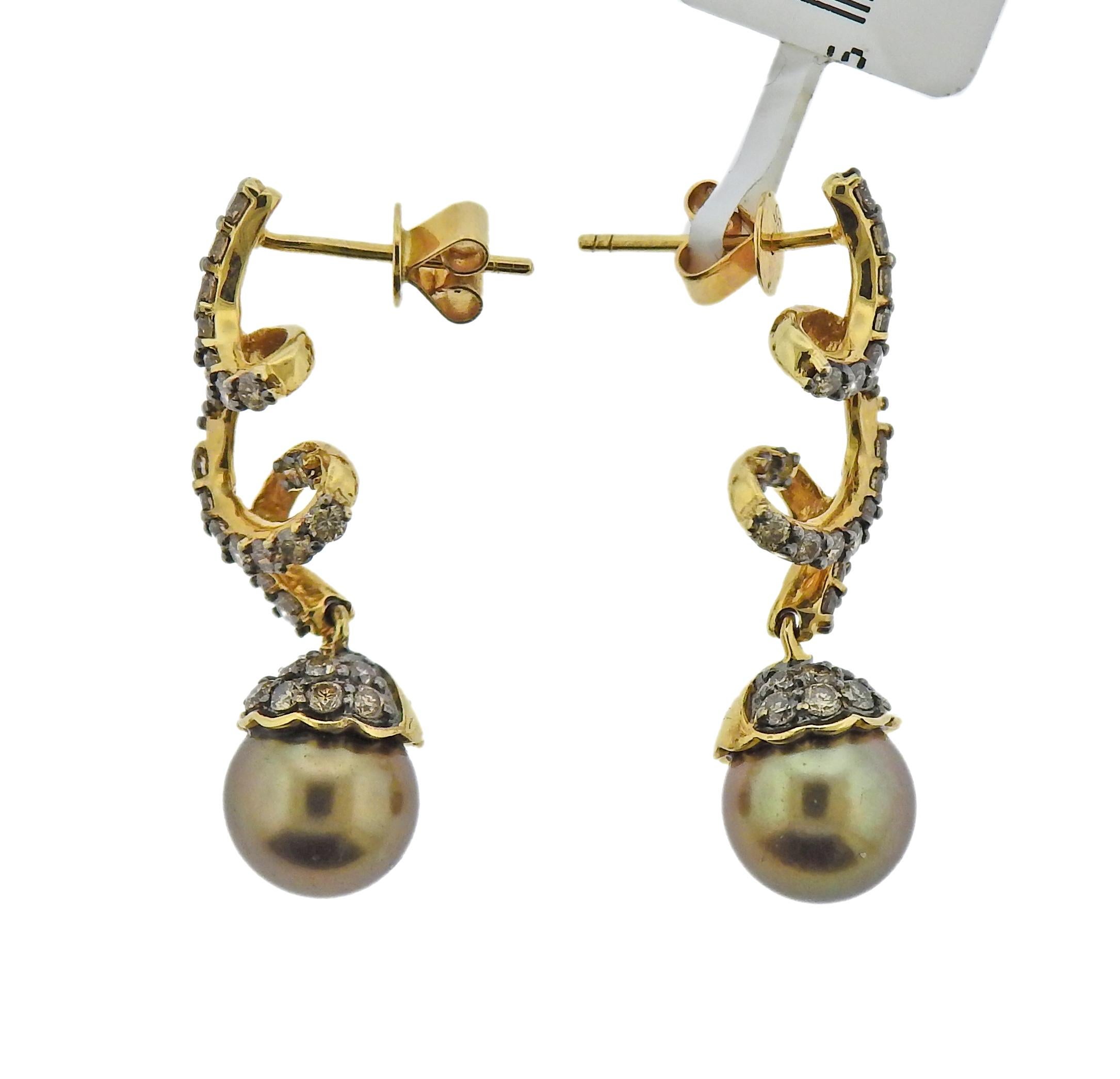 New Le Vian 14k gold earrings with 8.5mm chocolate pearls and approx. 1.20ctw in fancy chocolate diamonds. Retail $5895, come with pouch. Earrings are 32mm long.  Weight - 5.7 grams. Marked:   14k, Le Vian mark. 
