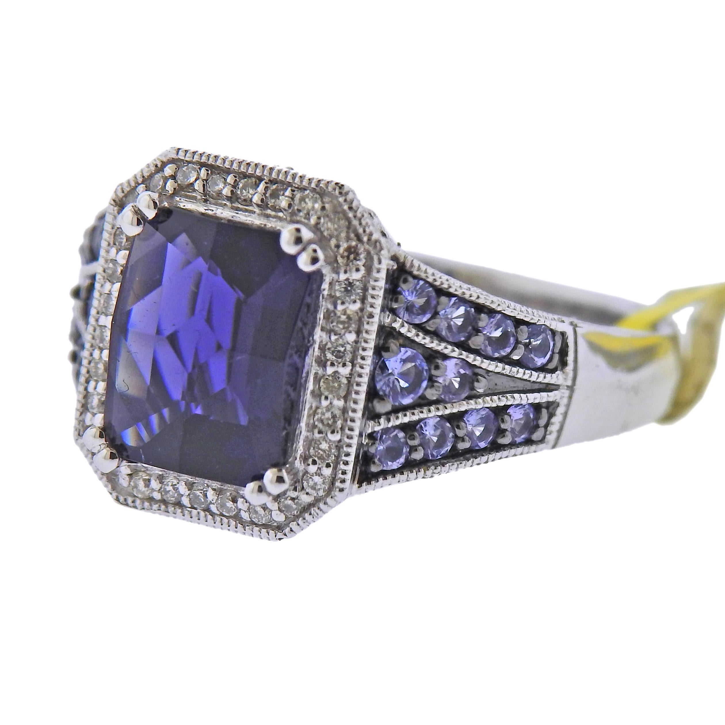 New Le Vian 14k gold ring 4.82ct blue zircon, iolites and blue topaxz and approx. 0.14ctw in diamonds.  Retail $6395. With pouch.  Ring size - 7, ring top - 13mm x 11mm. Marked: Ring size - 7, ring top - 13mm x 11mm. Weight - 5.9 grams. 