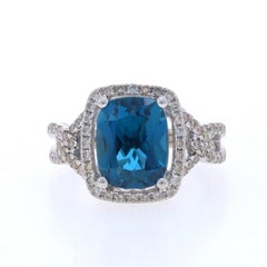 Le Vian London, bague halo de topaze bleue et diamants - or blanc 14 carats coussin 4,50 carats