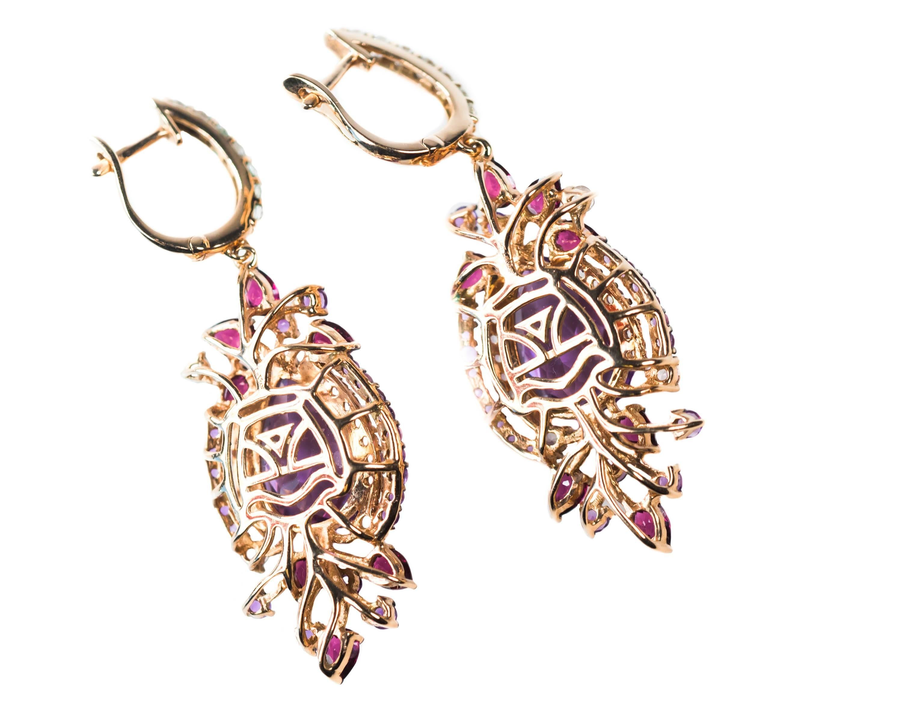 Le Vian Crazy Collection Multi-Stone Drop Earrings in 14 Karat Strawberry Rose Gold - 13.5 carat total weight

Features 9.75 carat total weight pear and round-cut Purple amethyst, 2.5 carat total weight pear-cut rhodolite and white topaz accents.