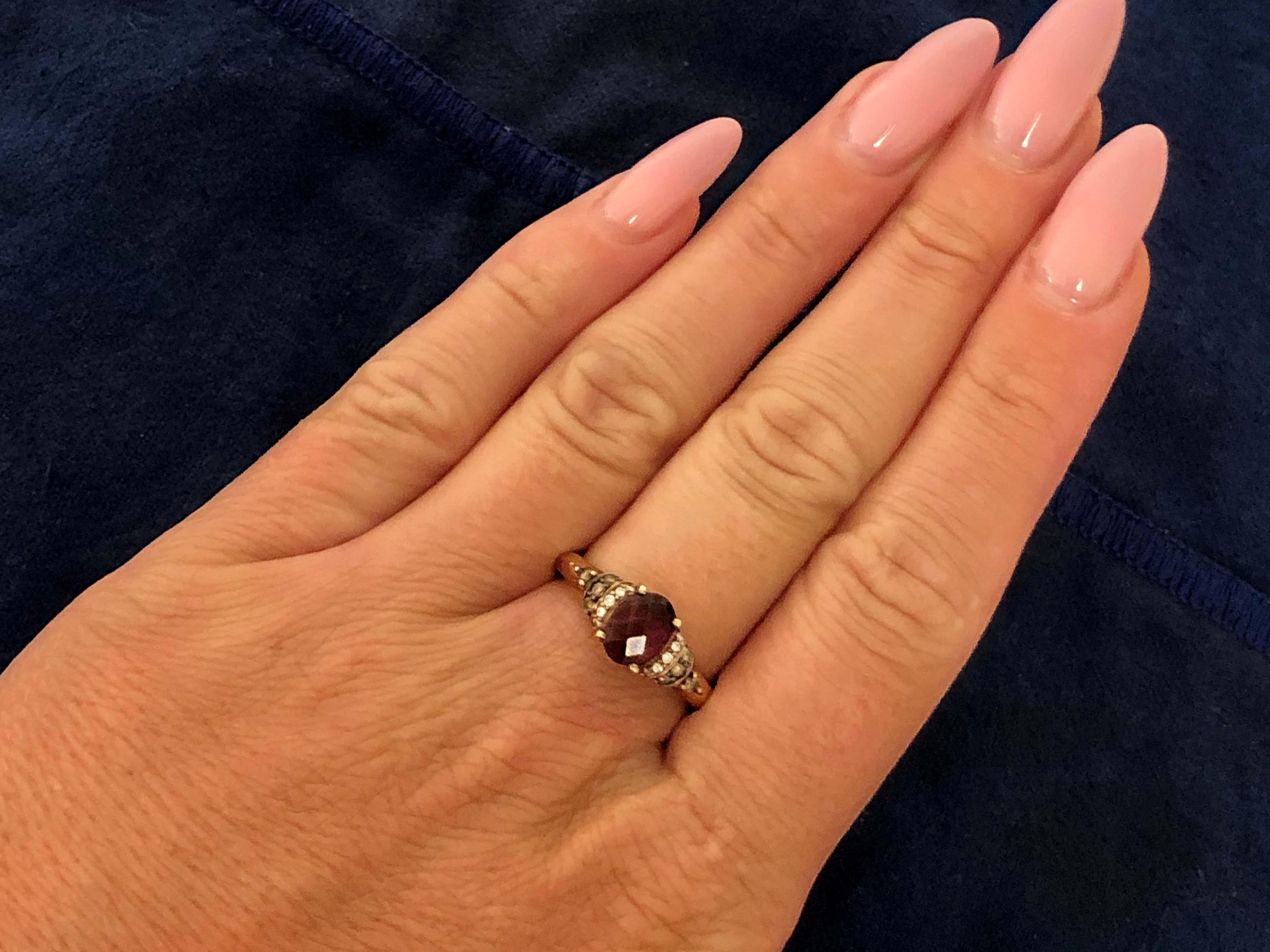 Ring Specifications:

Designer: Le Vian

Metal: 14k Rose Gold

Total Weight: 3.1 Grams

Diamond Count: 18 (10 white and 8 champagne-chocolate)

Diamond Clarity: SI1

Diamond Color: 10 G-H and 8 champagne-chocolate

Diamond Carat Weight: 0.12