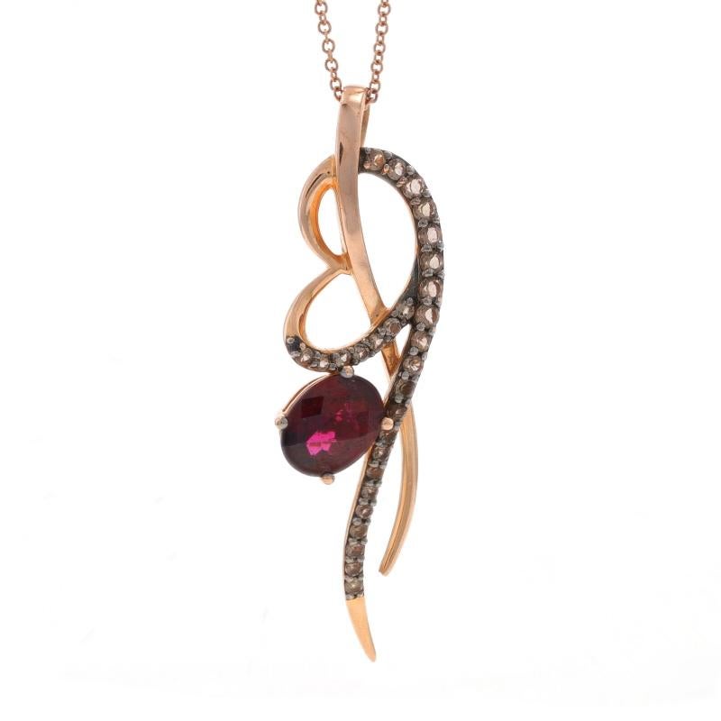 Retail Price: $1,799

Brand: Le Vian

Metal Content: 14k Rose Gold

Stone Information

Natural Rhodolite Garnet
Carat(s): 2.00ct
Cut: oval checkerboard

Natural Chocolate quartz
Carat(s): .50ctw
Cut: Round

Total Carats: 2.50ctw

Style: Solitaire