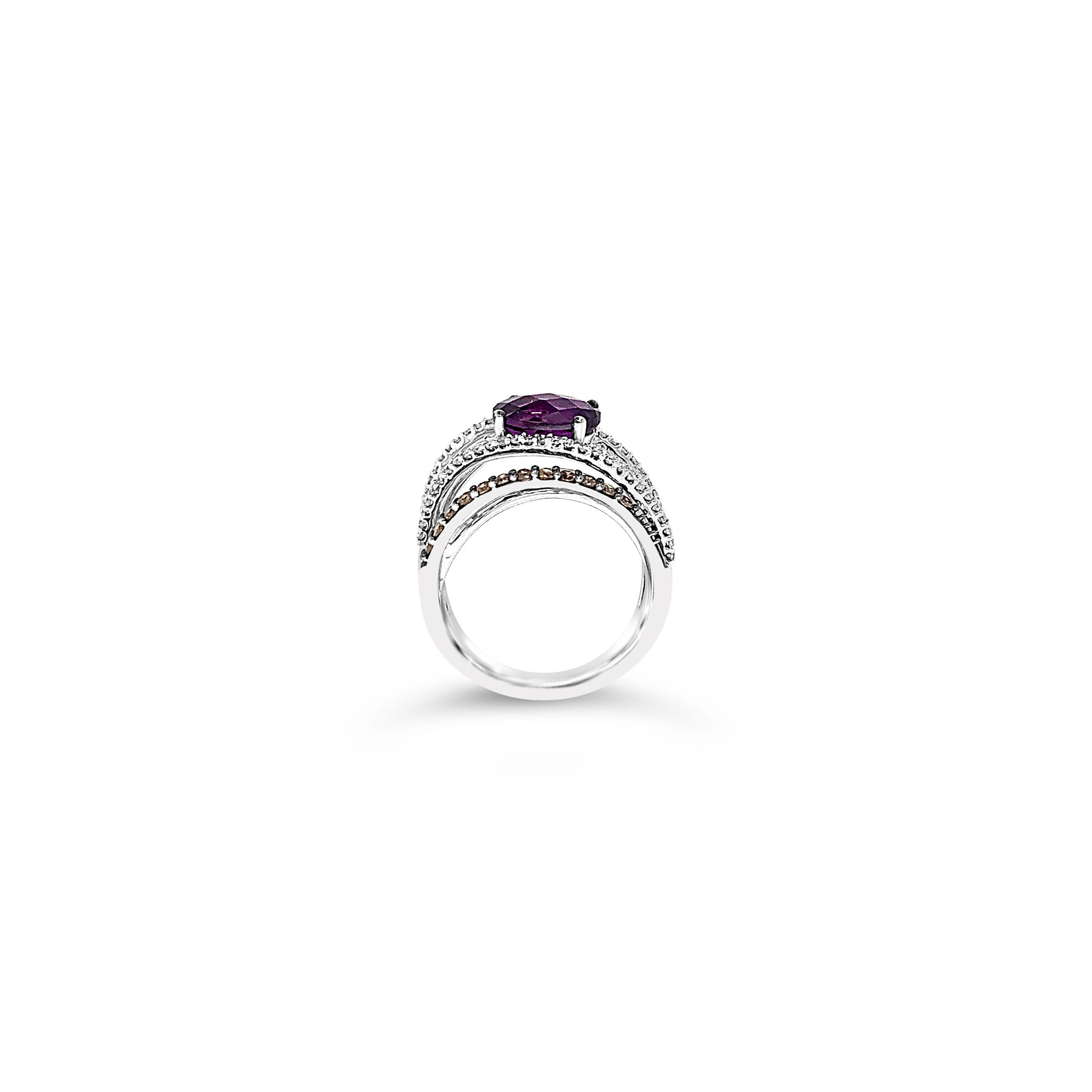 Le Vian® Ring featuring 1.45 cts Grape Amethyst™, .43 cts Chocolate Diamonds®, .27 cts Vanilla Diamonds® set in 14K Vanilla Gold®

Diamonds Breakdown:
.43 cts Brown Diamonds
.27 cts White Diamonds

Gems Breakdown:
1.45 cts Amethyst

Ring may or may