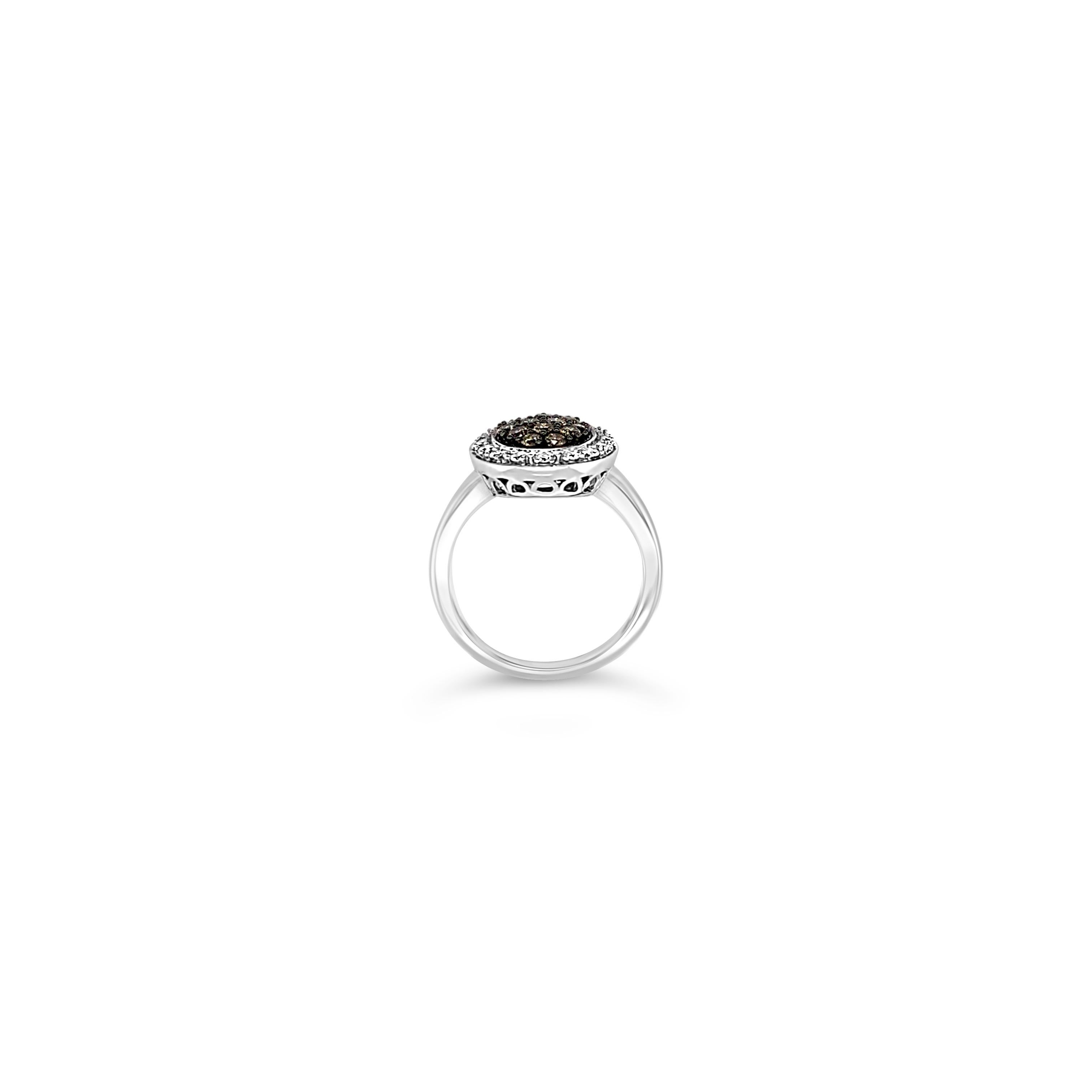 Le Vian® Ring featuring .35 cts. Chocolate Diamonds®, .11 cts. Vanilla Diamonds® set in 14K Vanilla Gold®

Diamonds Breakdown:
.35 cts Brown Diamonds
.11 cts White Diamonds

Gems Breakdown:
None

Ring may or may not be sizable, please feel free to