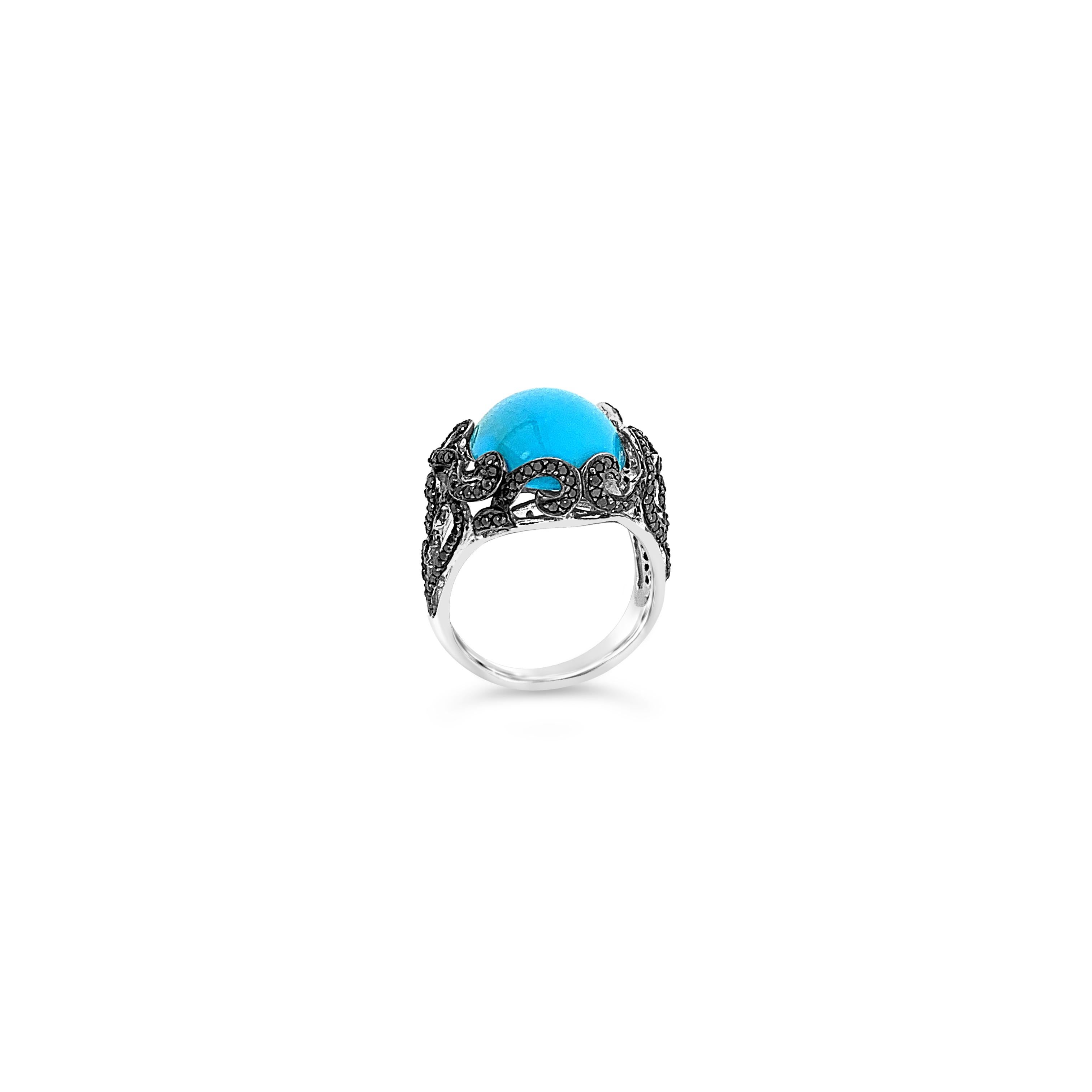 Le Vian® Ring featuring 6 1/3 cts. Robins Egg Blue Turquoise™, 7/8 cts. Black Diamonds set in 14K Vanilla Gold®

Diamonds Breakdown:
7/8 cts Black Diamonds

Gems Breakdown:
6 1/3 cts Turquoise

Please feel free to reach out with any questions!

Item
