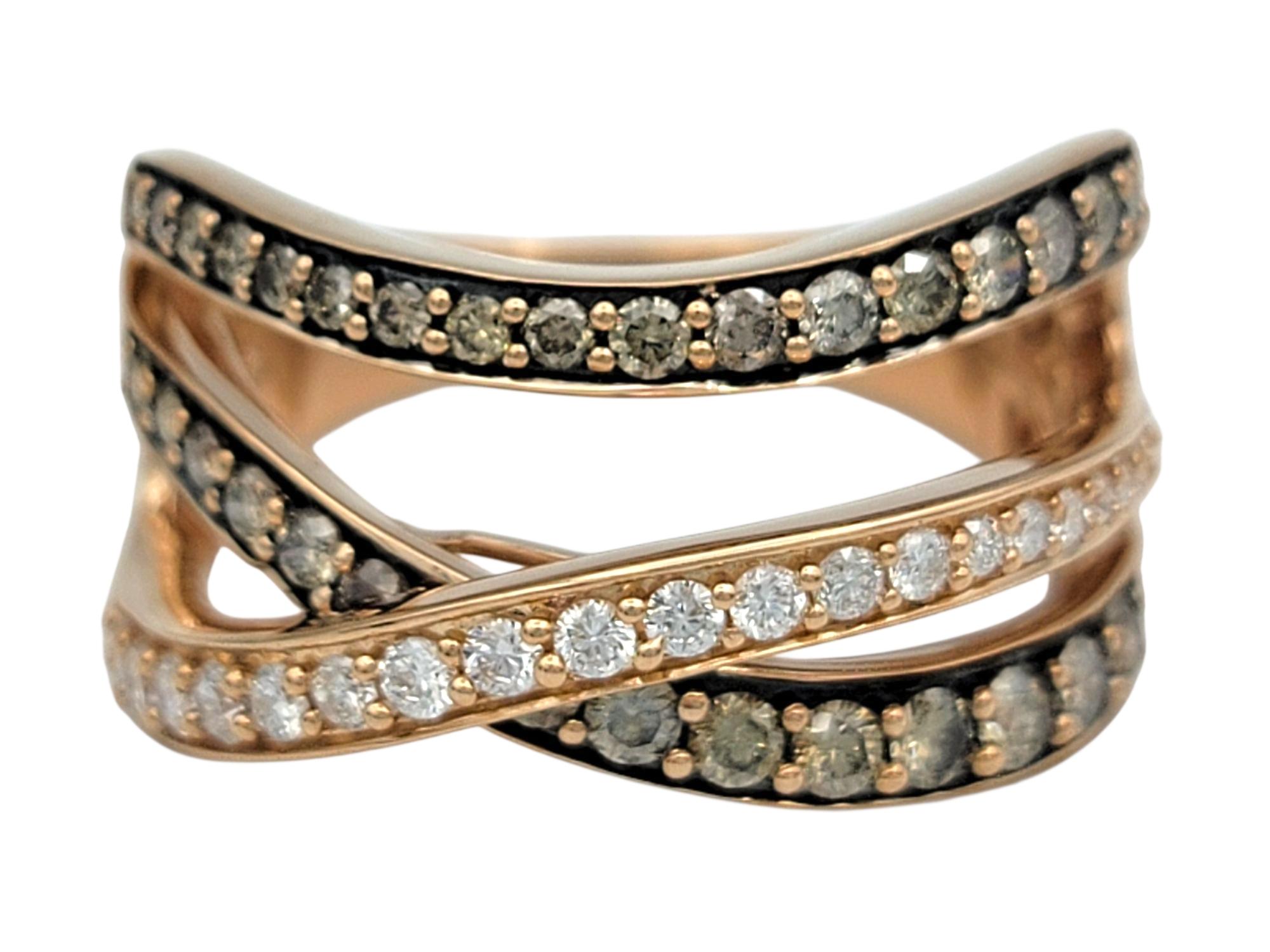 Ring Size: 6.75

This Le Vian diamond ring dazzles with contemporary elegance and rich contrast. Crafted in 14 karat rose gold, the band features an overlapping, crisscross design that combines classic white diamonds with brown diamonds for an