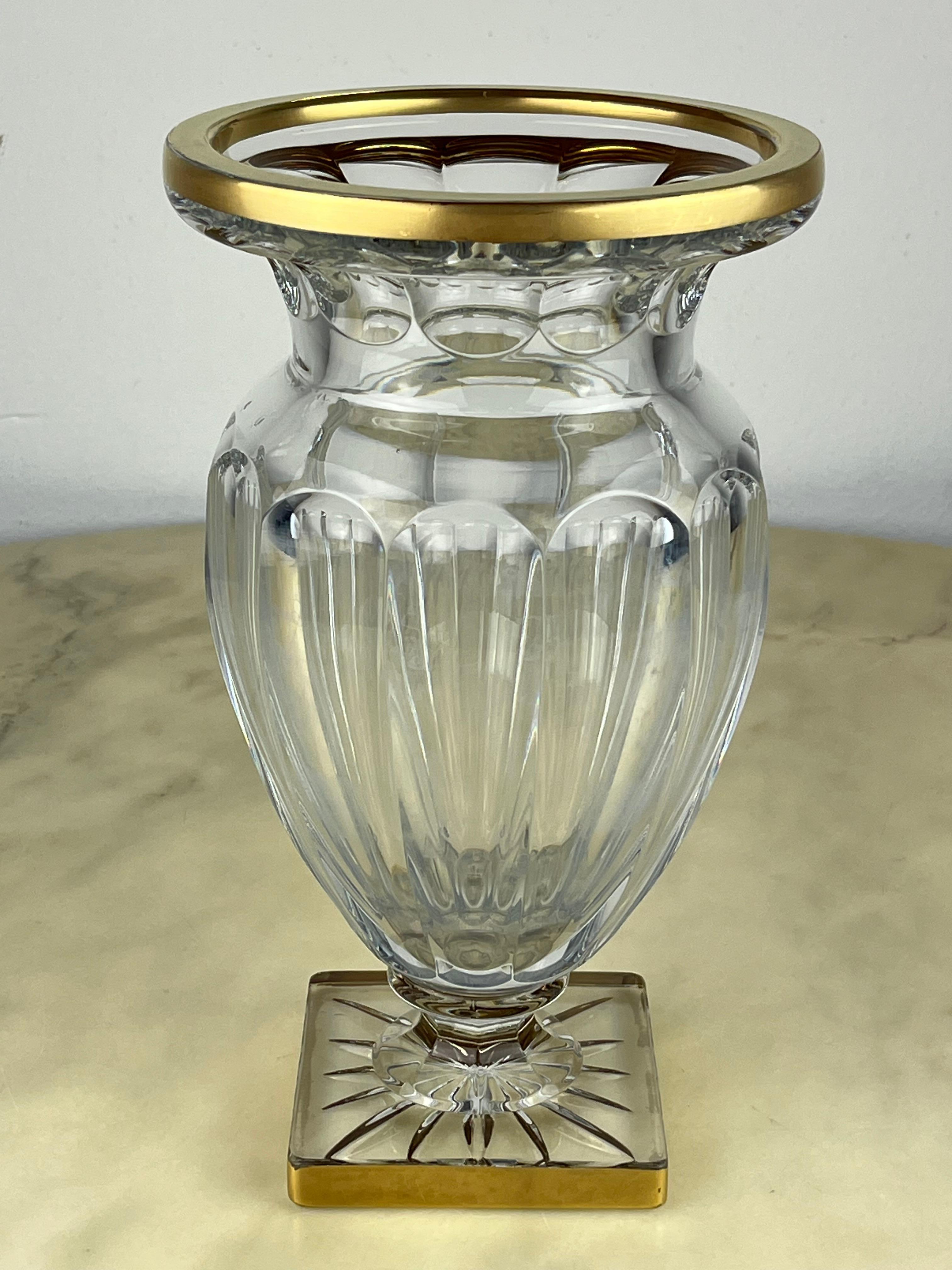 Lead crystal vase, France, 1980s
Intact, it has pure gold decorations on the edges which have small defects.
It is very beautiful and elegant.
If you look at the descriptive photographs, you will notice small air bubbles inside the glass which