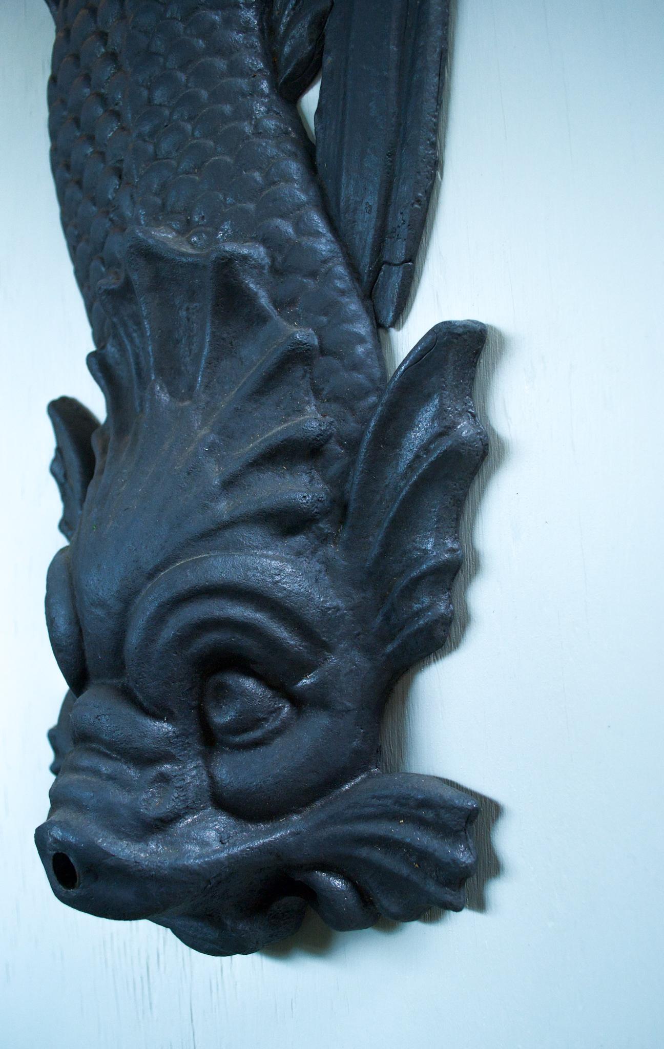 Featuring a beautiful baroque style dolphin, this lovely English lead downspout is as decorative as it is functional. From the workshop of Stephen C. Markham, this downspout is manufactured by hand using only British lead, made to withstand the