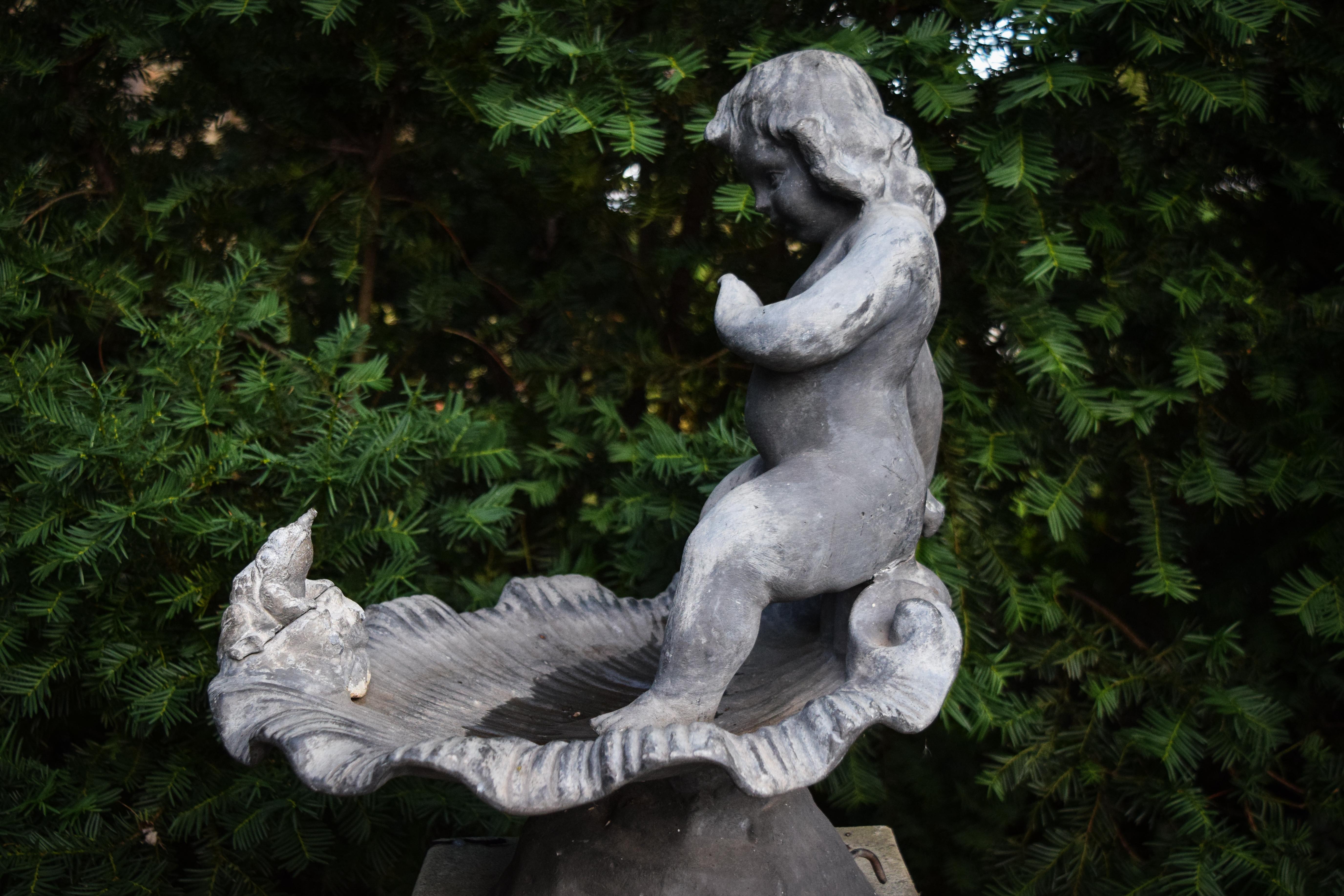 English lead offers a sophistication to any gardenscape or terrace. This whimsical vintage fountain is a classical scene featuring a playful frog and child. This fully functional fountain will stay perpetually youthful for decades to come.