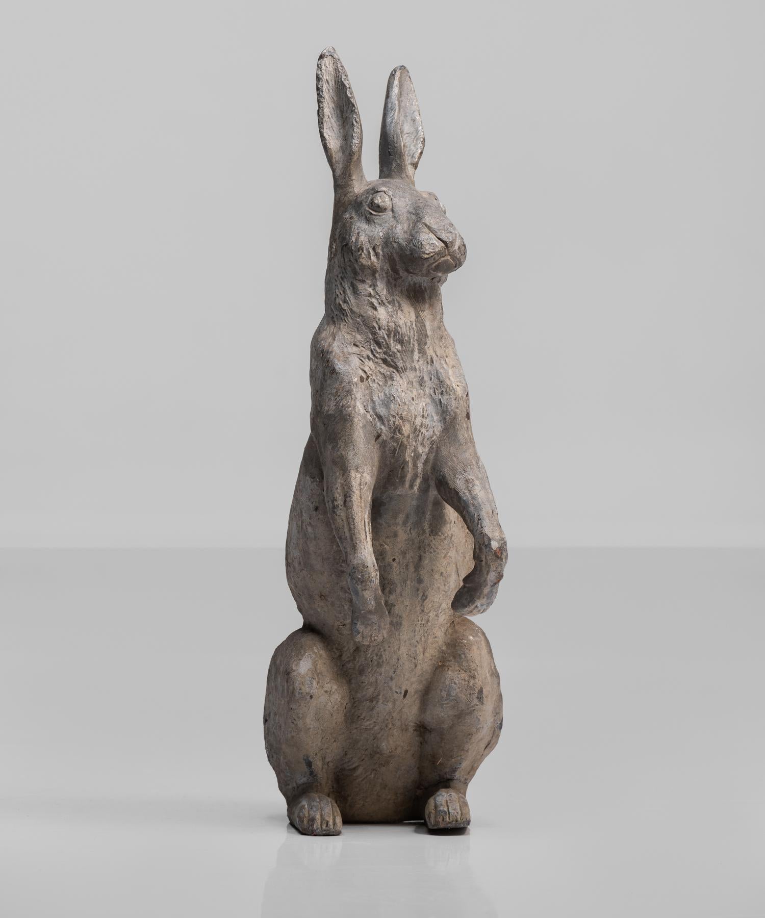 Lead garden rabbit, England, circa 1920.

An attentive garden friend with perched ears and incredible patina.
