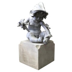 Lead Garden Statue Ornament of a Putto or Cherub Emblematic of Peace