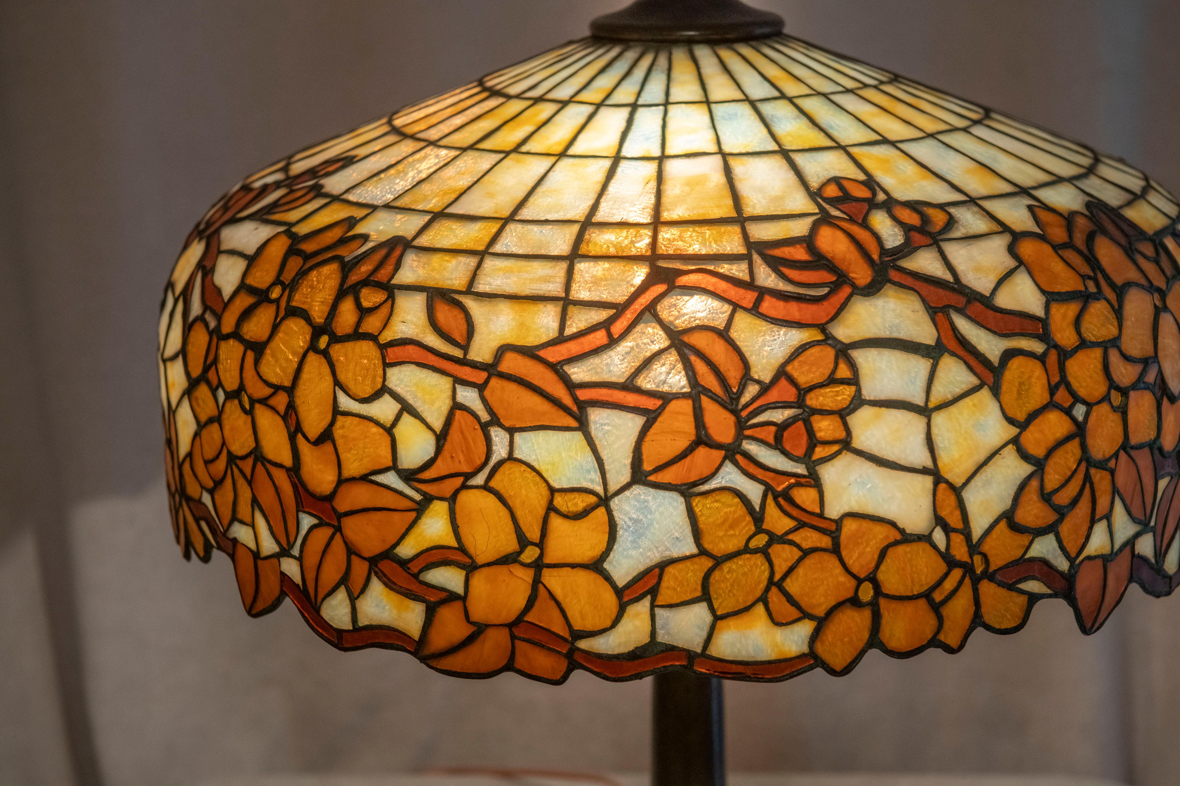  I saw this lamp 40 years ago and tried to buy it. The owner sadly passed away a few months ago and his widow called me first and the wait was over.
A very high quality lamp by Lamb Bros. One of their higher quality lamps. 2 colors of brown flowers